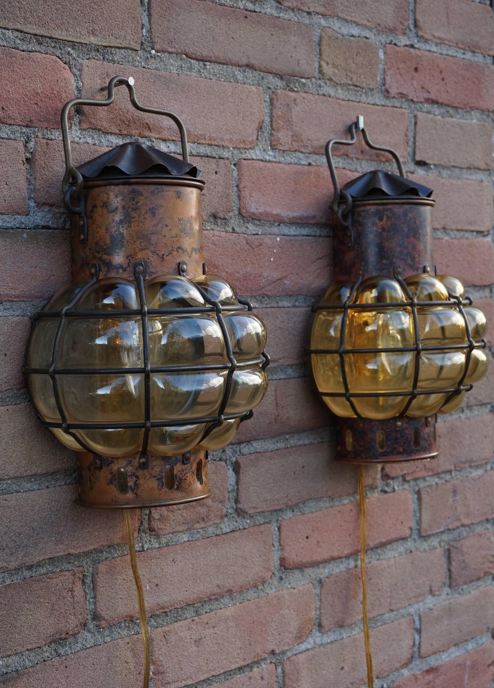 Hand-Crafted Pair of Nautical Theme Ships Wall Lamps with Amber Glass Blown in Brass Frames