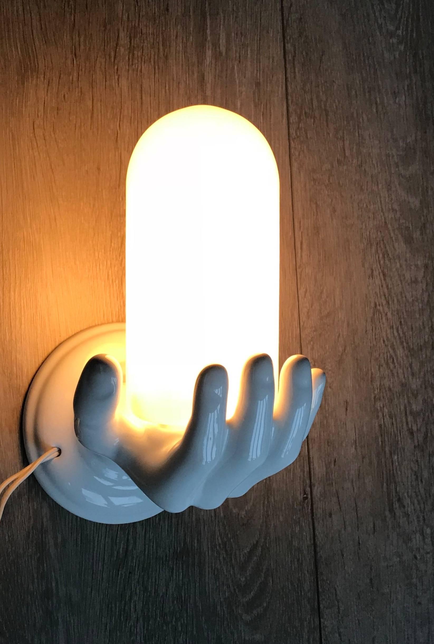 1970s Glazed White Ceramic Right Hand Holding a Glass Wall Sconce or Wall Light In Excellent Condition In Lisse, NL