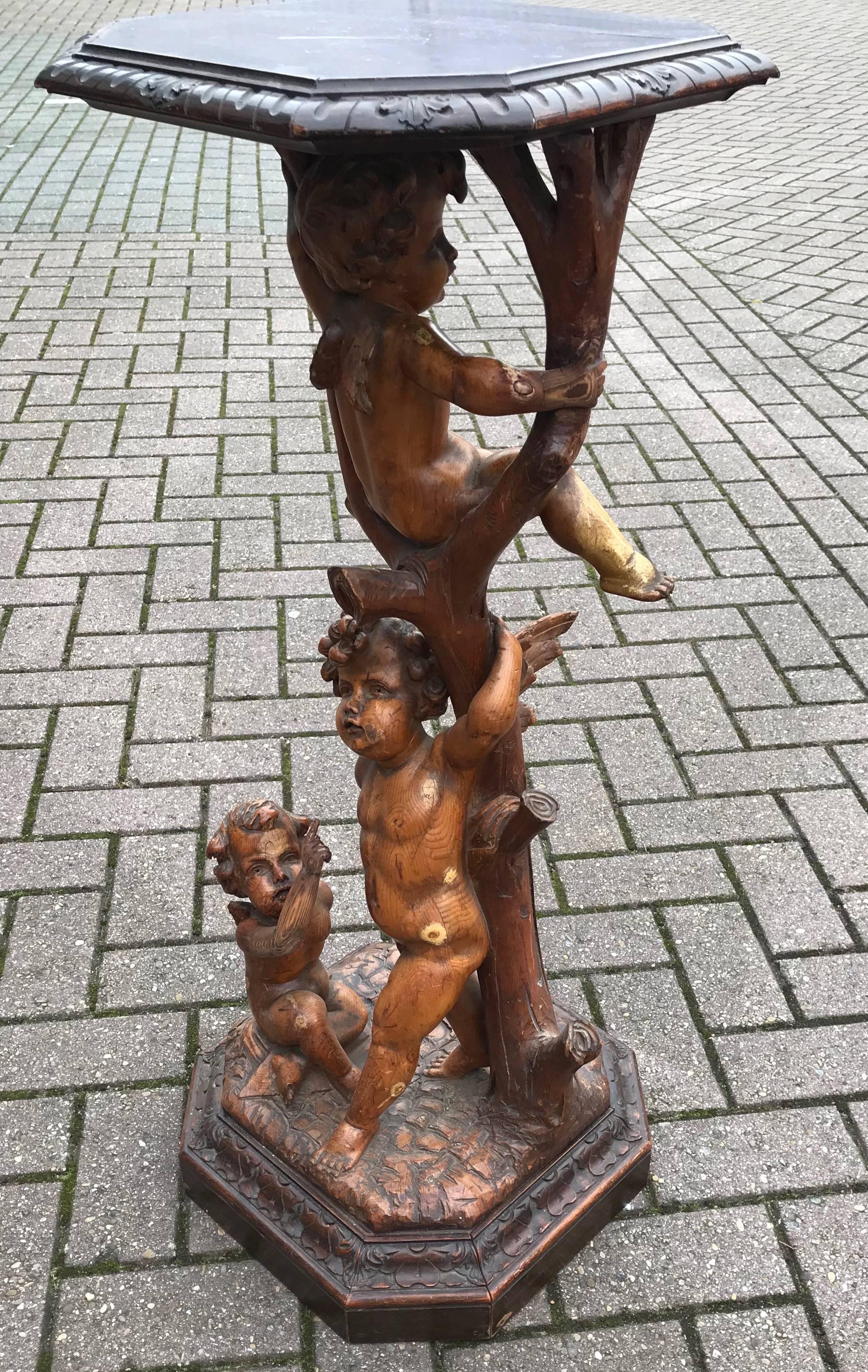 Antique Carved Baroque Style Playful Cherub Group Center Display Stand Pedestal In Fair Condition For Sale In Lisse, NL