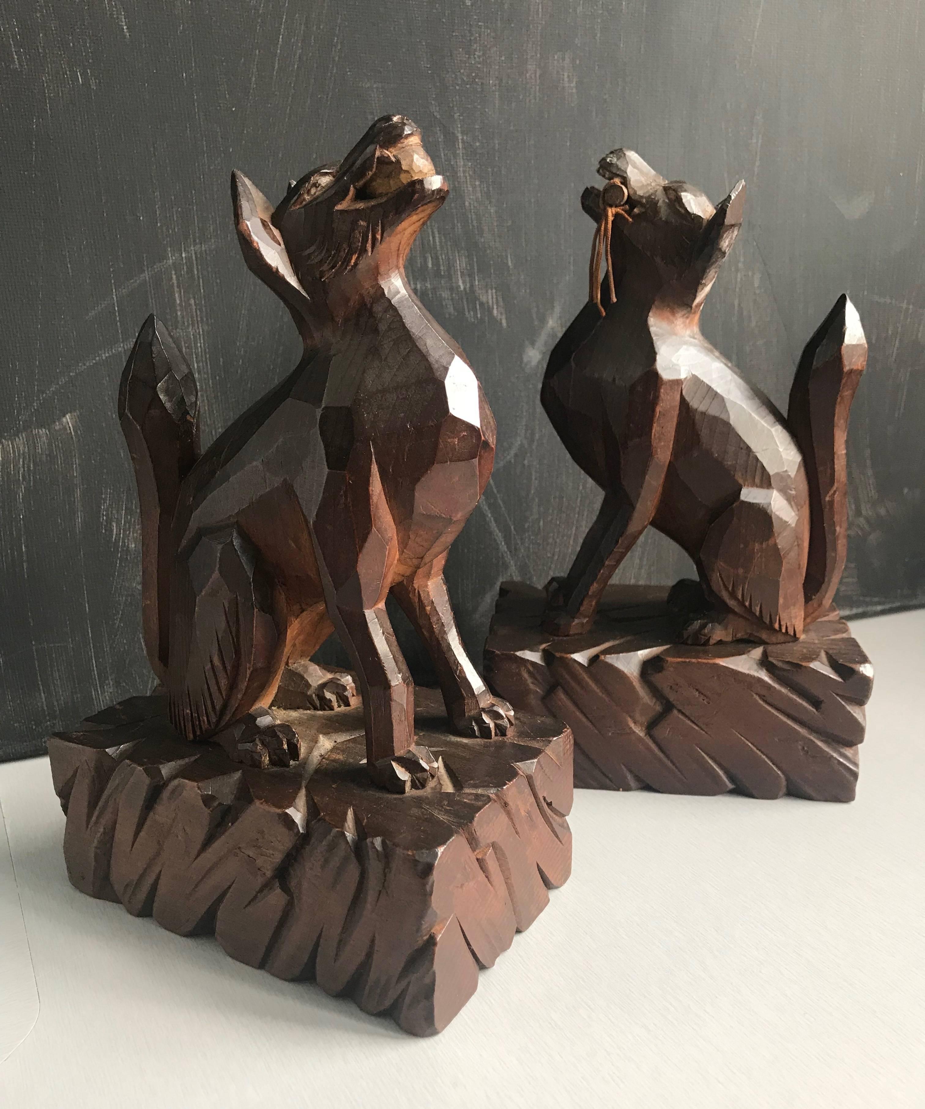 Go fetch!!

These wonderfully stylized dog sculptures truly display the energy and joy of dogs when they have just fetched an object. They can't wait for you to take the stick or ball back from them so they can retrieve it again, and again and