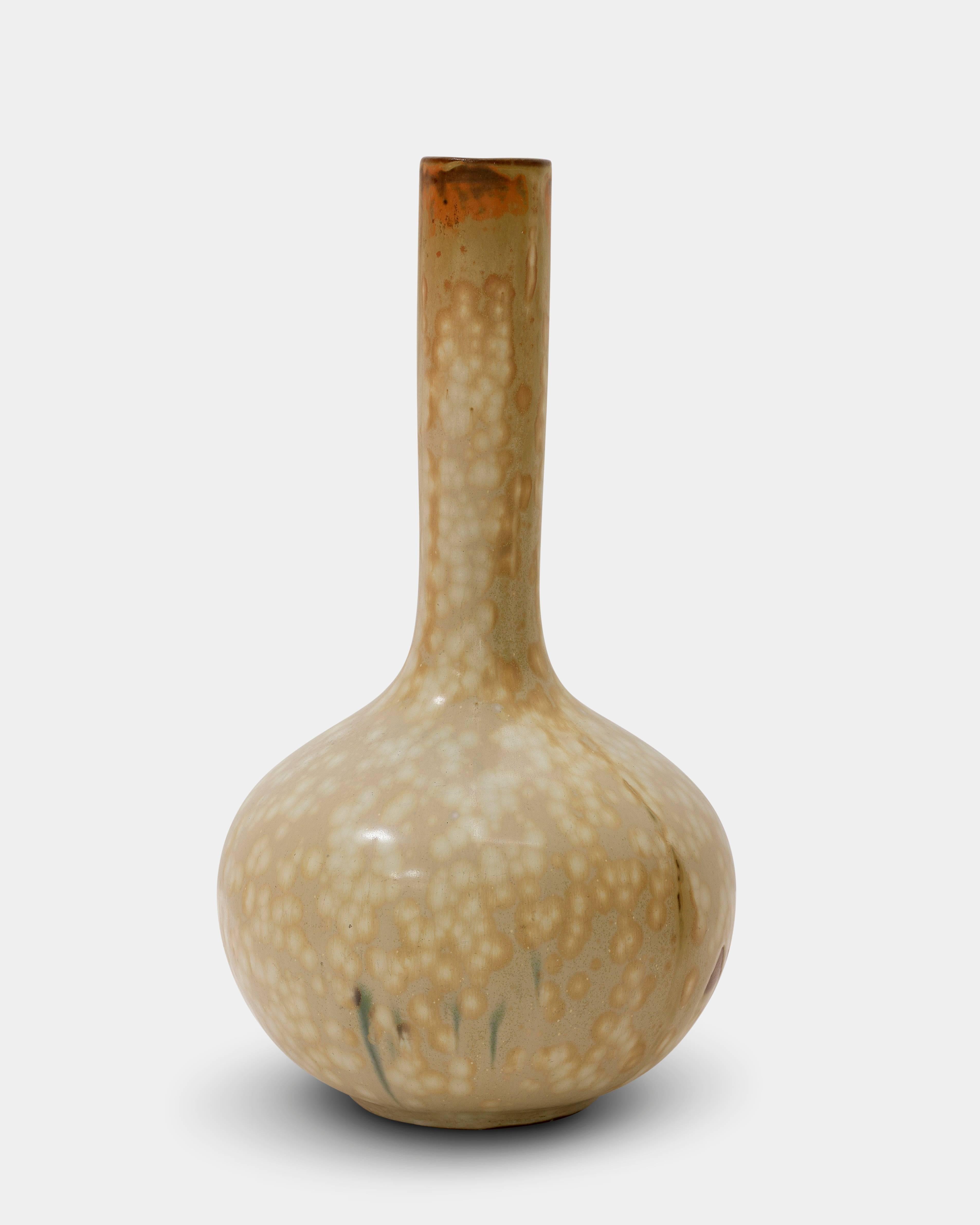Axel Salto (1889-1961):

Stoneware vase decorated with matte crystalline glaze in great and peach color.
Manufactured in the 1940-1950s for Royal Copenhagen.
Signed 