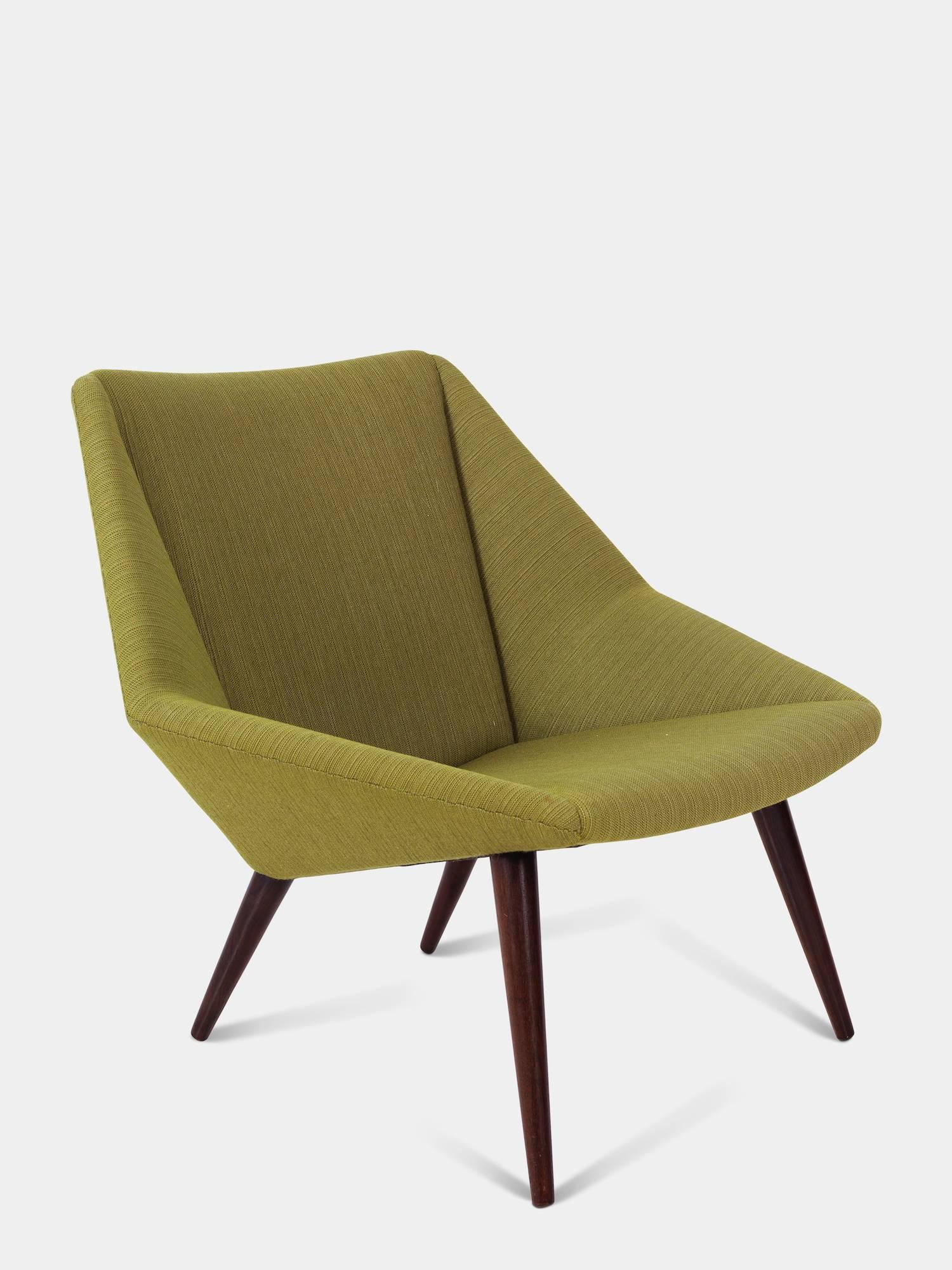 Nanna Ditzel (1923-2005)

Mid-century danish modern Lounge chair from the 1950s, designed in a retrofuturistic style by danish Nanna Ditzel. 
Model 93. 
Manufactured by Søren Villadsen. An original vintage piece. 
 