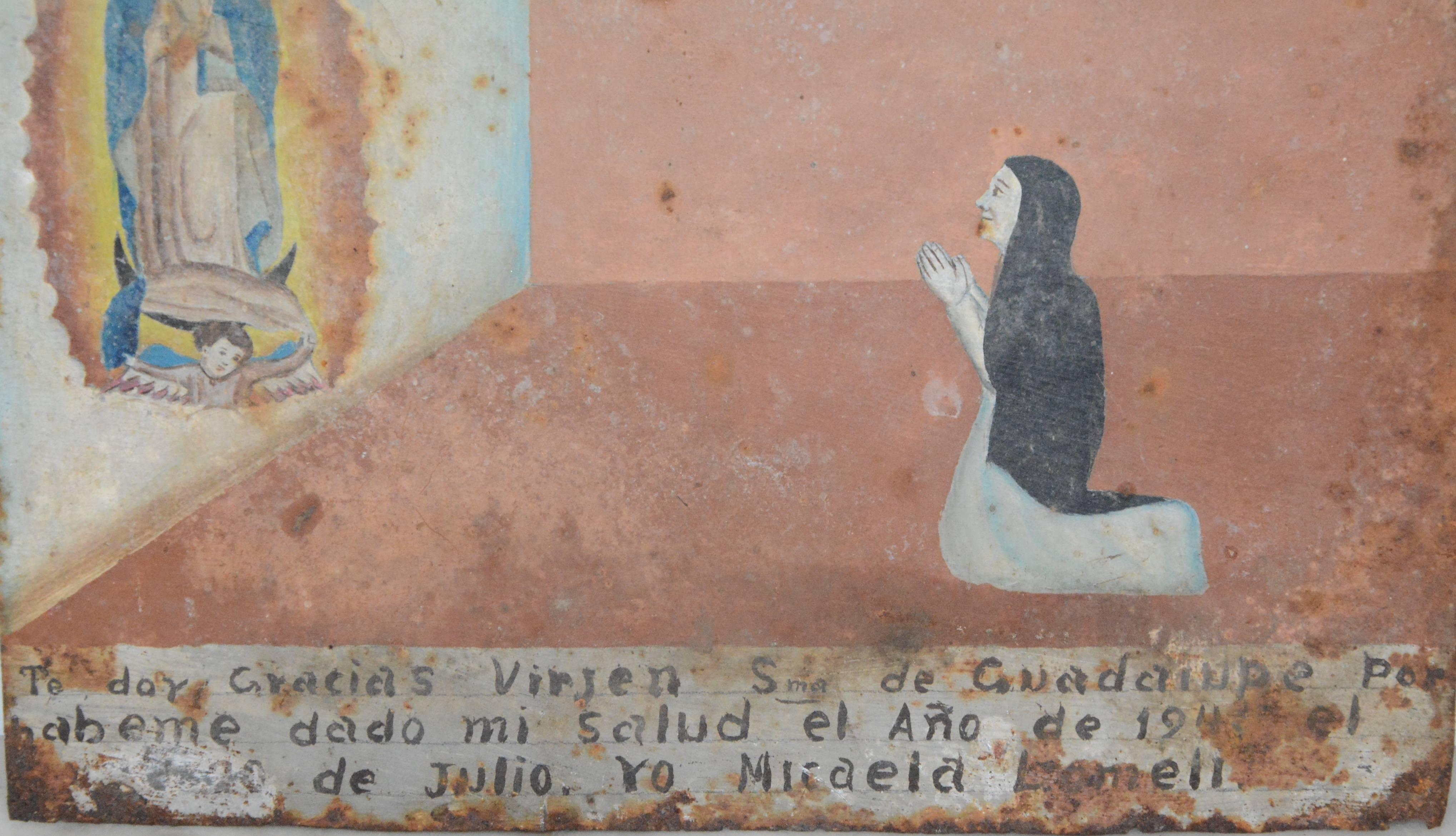 We are offering you a unique Folk Art painting of a woman worshipping Mary. It is painted on tin with soft colors and Spanish writing on the bottom. The piece is dated July 20, 1941. The writing tells the story of the woman worshipping.
