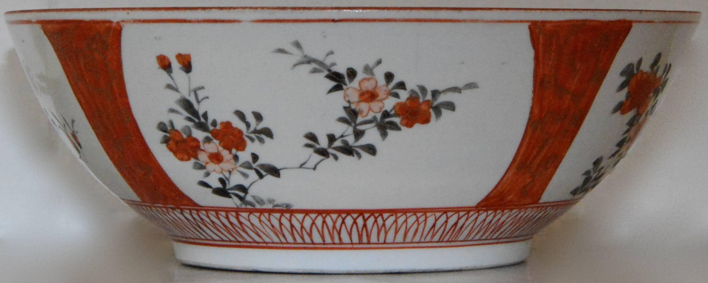 Bountiful orange tone flowers will make this a colorful addition to your Oriental collection. A hand painted border surrounds the floral display. The inside of the bowl tells a story all is own. There is a signature on the bottom.