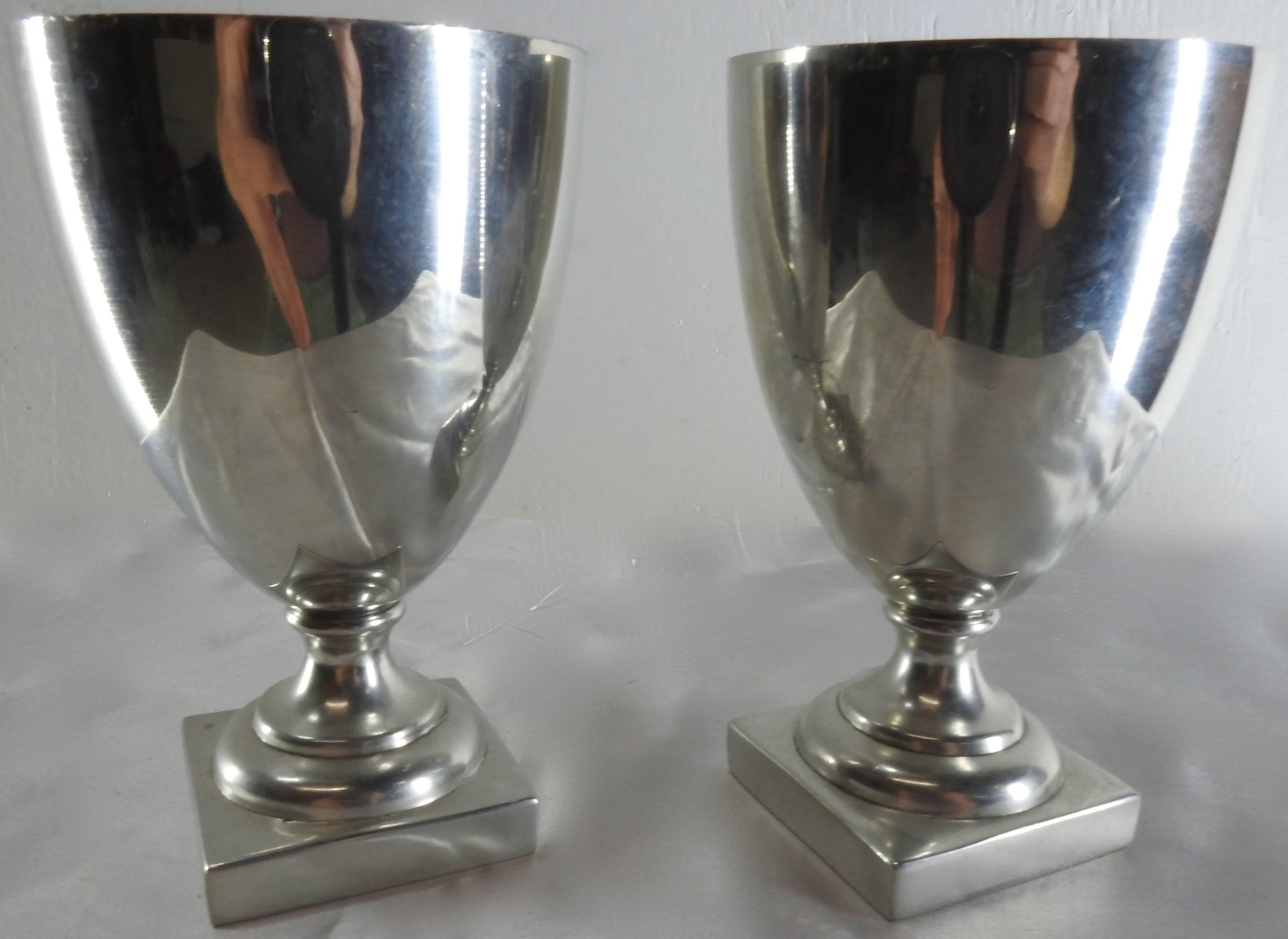 Featured is a pair of Williamsburg goblets by Shirley Pewter which has been in business over 50 years. The goblets are mounted on a square base and the Classic style is beautiful.