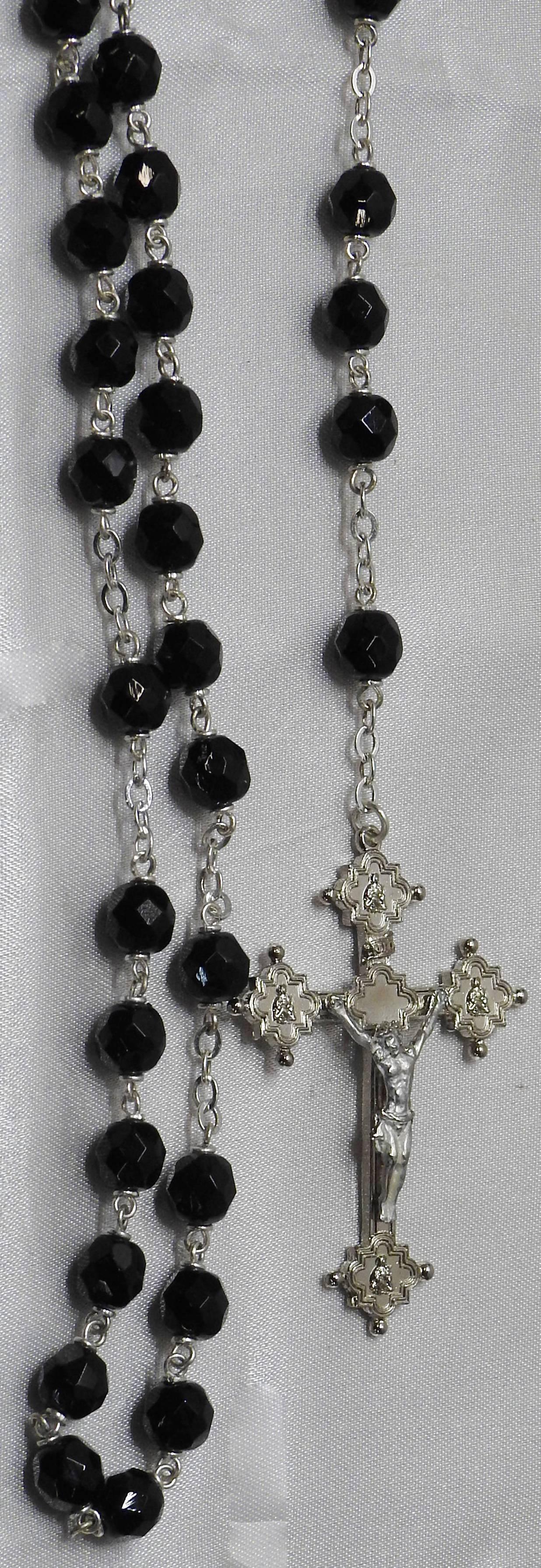 This is a rosary from the Vatican Library collection. It was manufactured in the Czech Republic and made of genuine Czech fire-polished crystal beads, this rosary features a crucifix inspired by crosses in the Museo Sacro, Biblioteca Apostolica