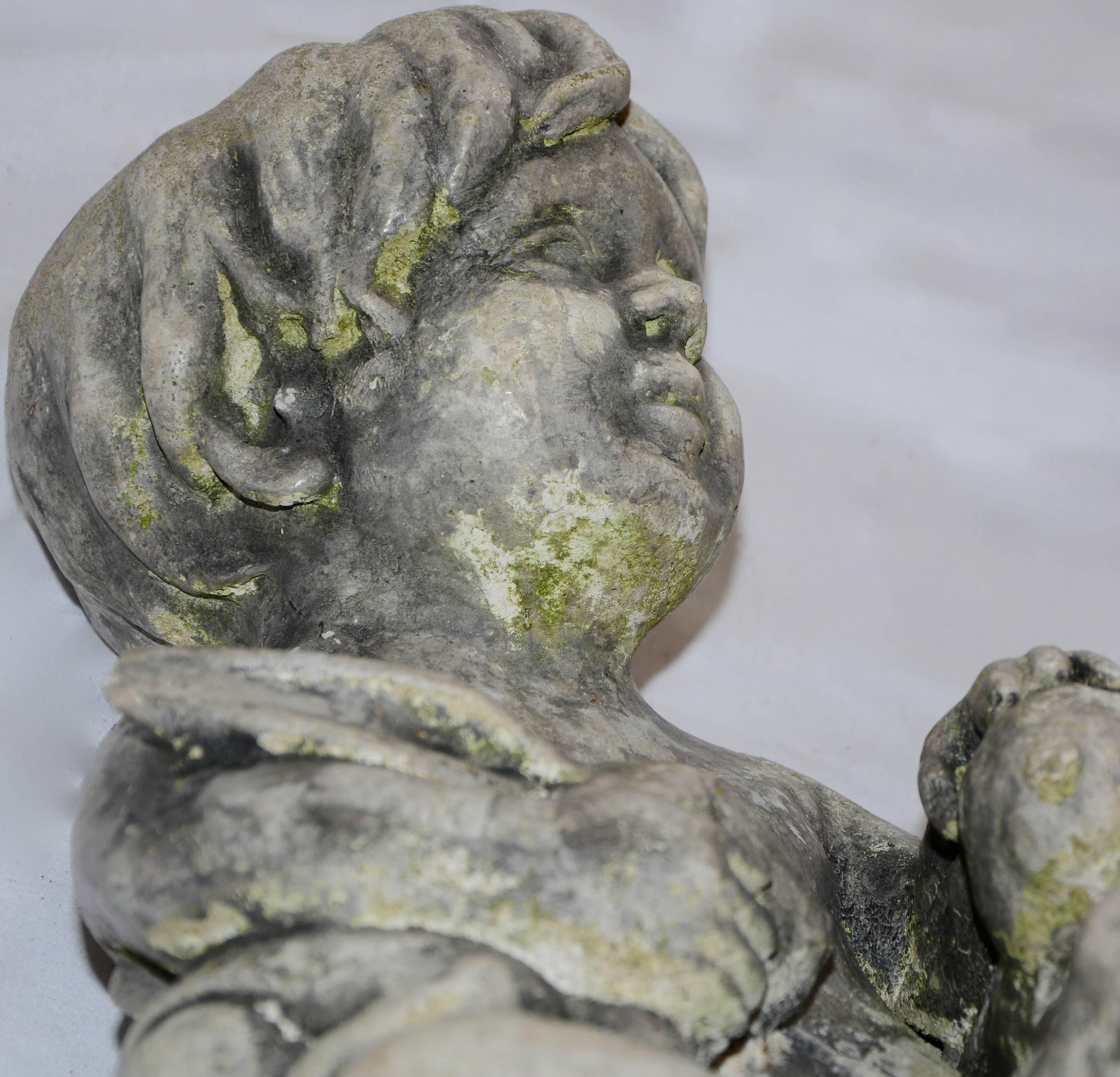 20th Century Cast Stone Statue of Baby Holding Bunnies For Sale