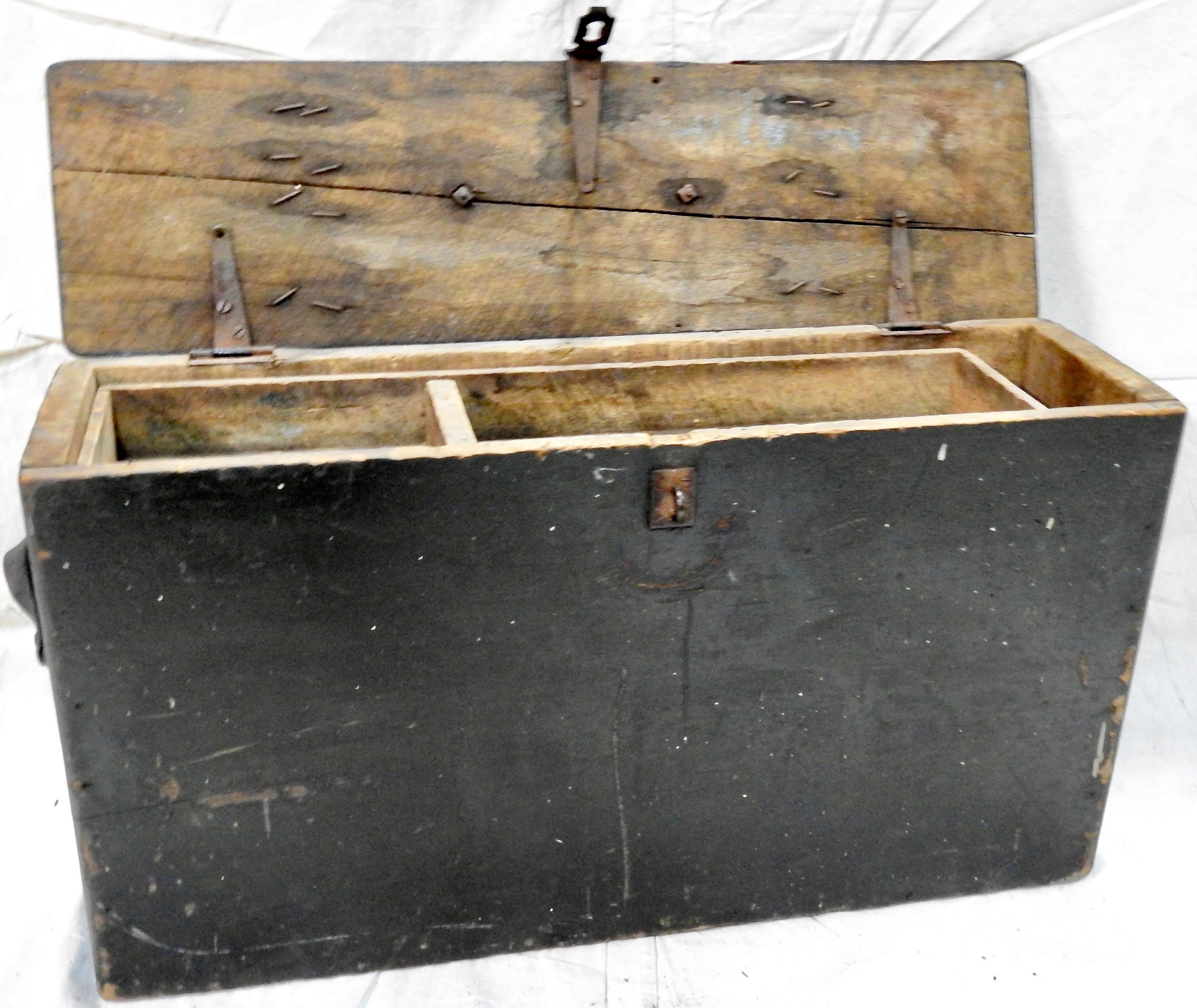 This Primitive tool box makes you wonder what it has held in its past. It has distressed black paint which will fit in with any decor. It boasts leather handles on the sides and the top. There is a metal clasp on the front if you choose to add a