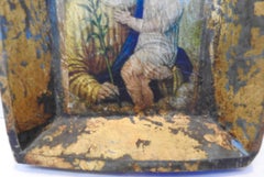 Saint and Baby on Hand Carved Wooden Frame
