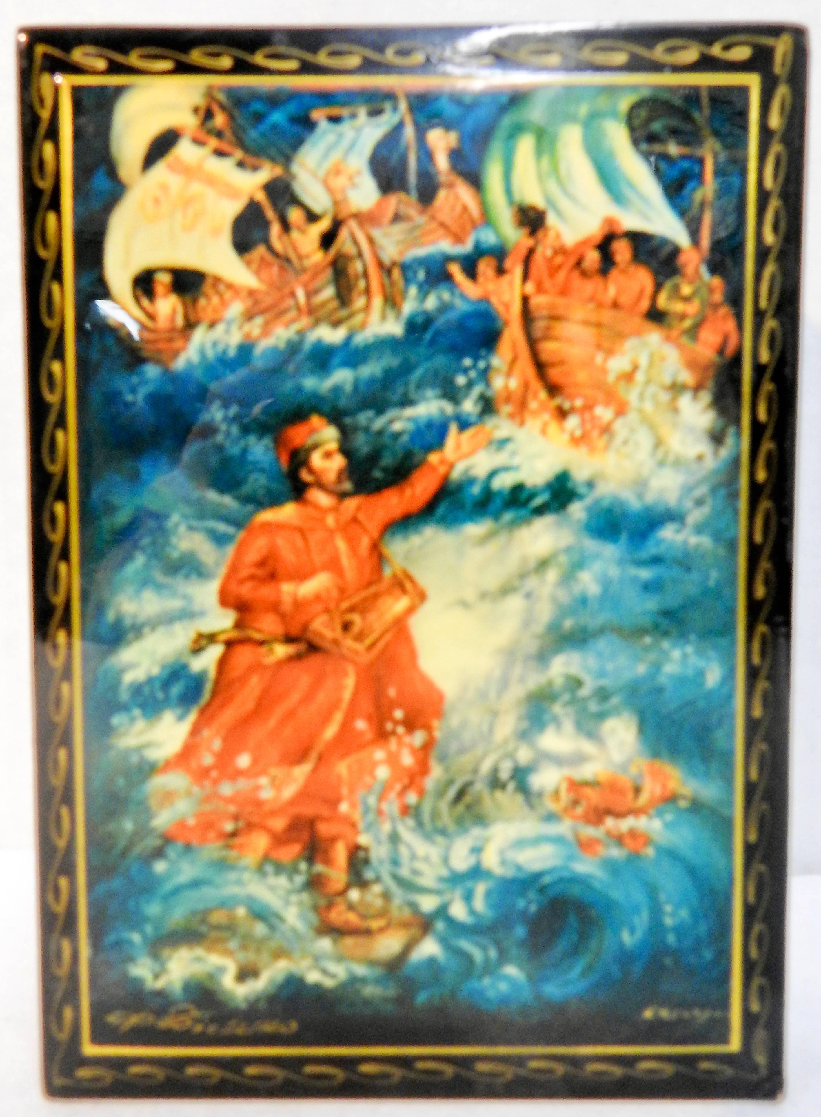 Fierce waves surround the characters and fish on this Russian black lacquer box. The inside opens to a vibrant red. The edges of the box are decorated with waves of gold. The top has been signed but we could not identify the artist.