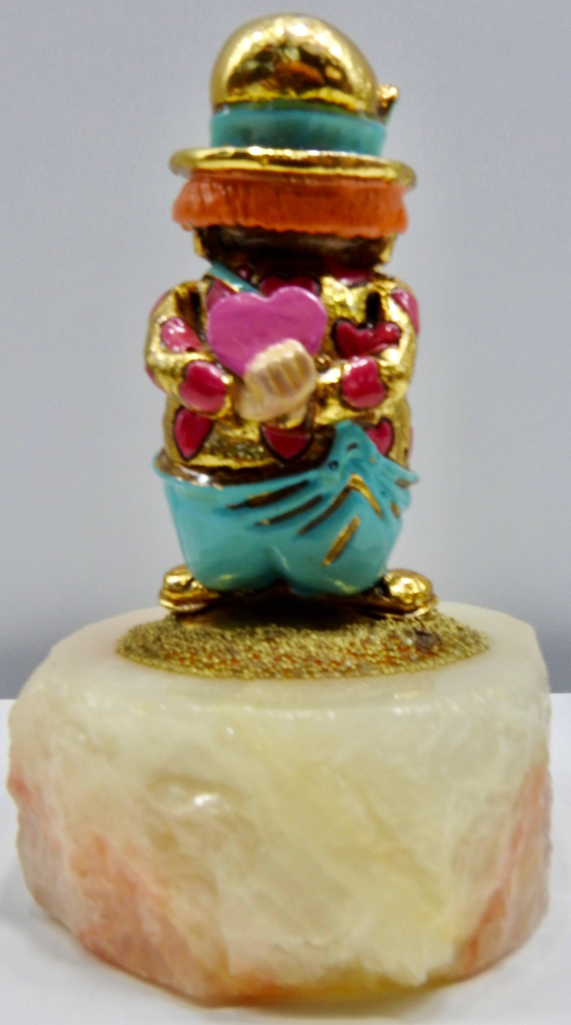 Will you be my Valentine? This clown by Ron Lee will love you forever! He has hearts all-over the place and the best one is the heart he is holding behind his back to surprise you with! He comes with his original tag and is signed and dated by the