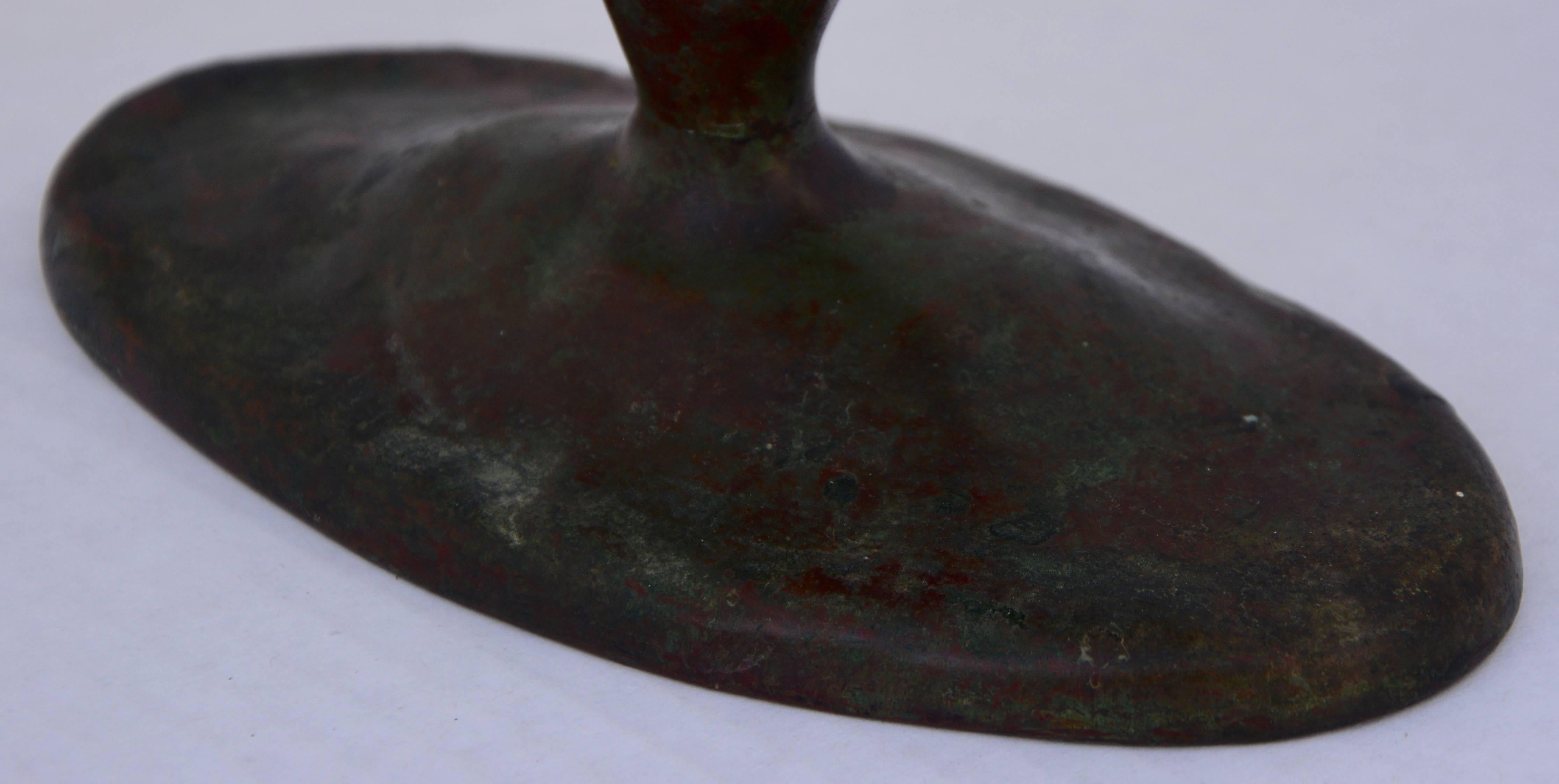 Louis Tiffany bronze four-arm candelabra with patinated bronze finish.
Bottom is stamped Tiffany Studios, New York, 8468.

 