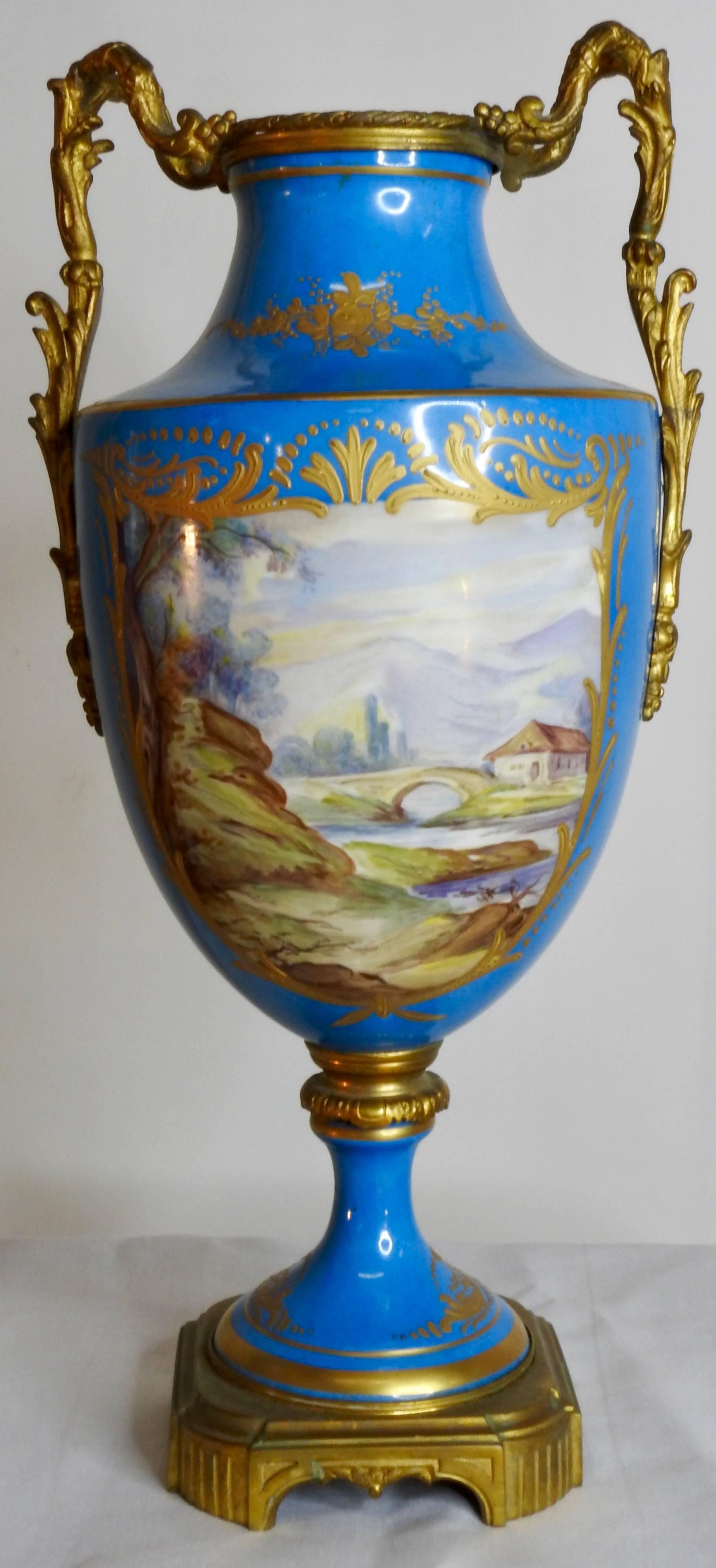 Gilt Sevre Urns Painted by E.F. Roger, 19th Century For Sale