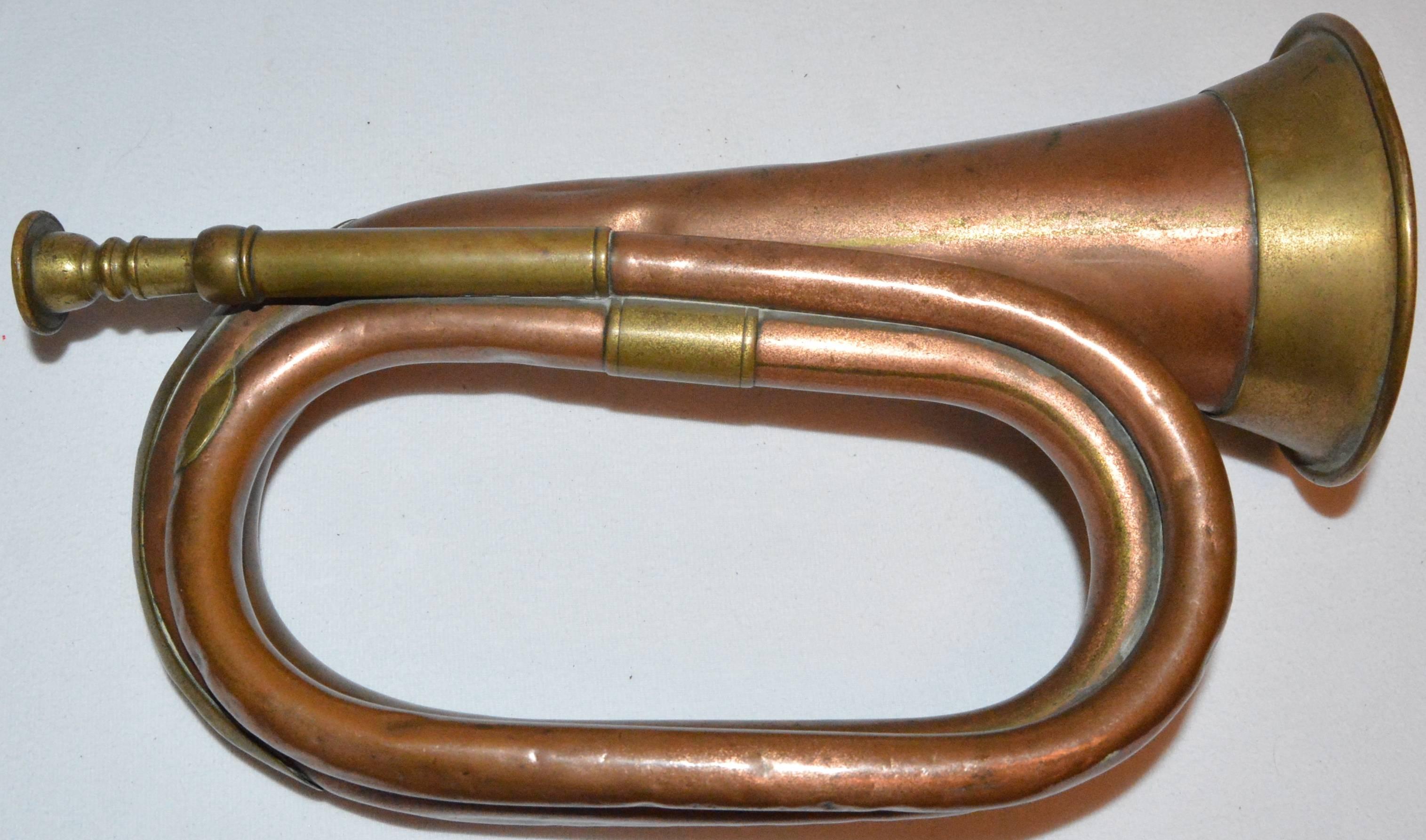 We are offering you a collectible copper and brass military bugle made by Henry Potter & Co., London, England. The bugle is a number “2” and is stamped on the bell with information about the maker and a date, 1941. Henry Potter & Co. was established