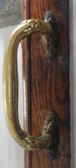 Pair of Glass Paneled Oak Doors with Bronze Hardware