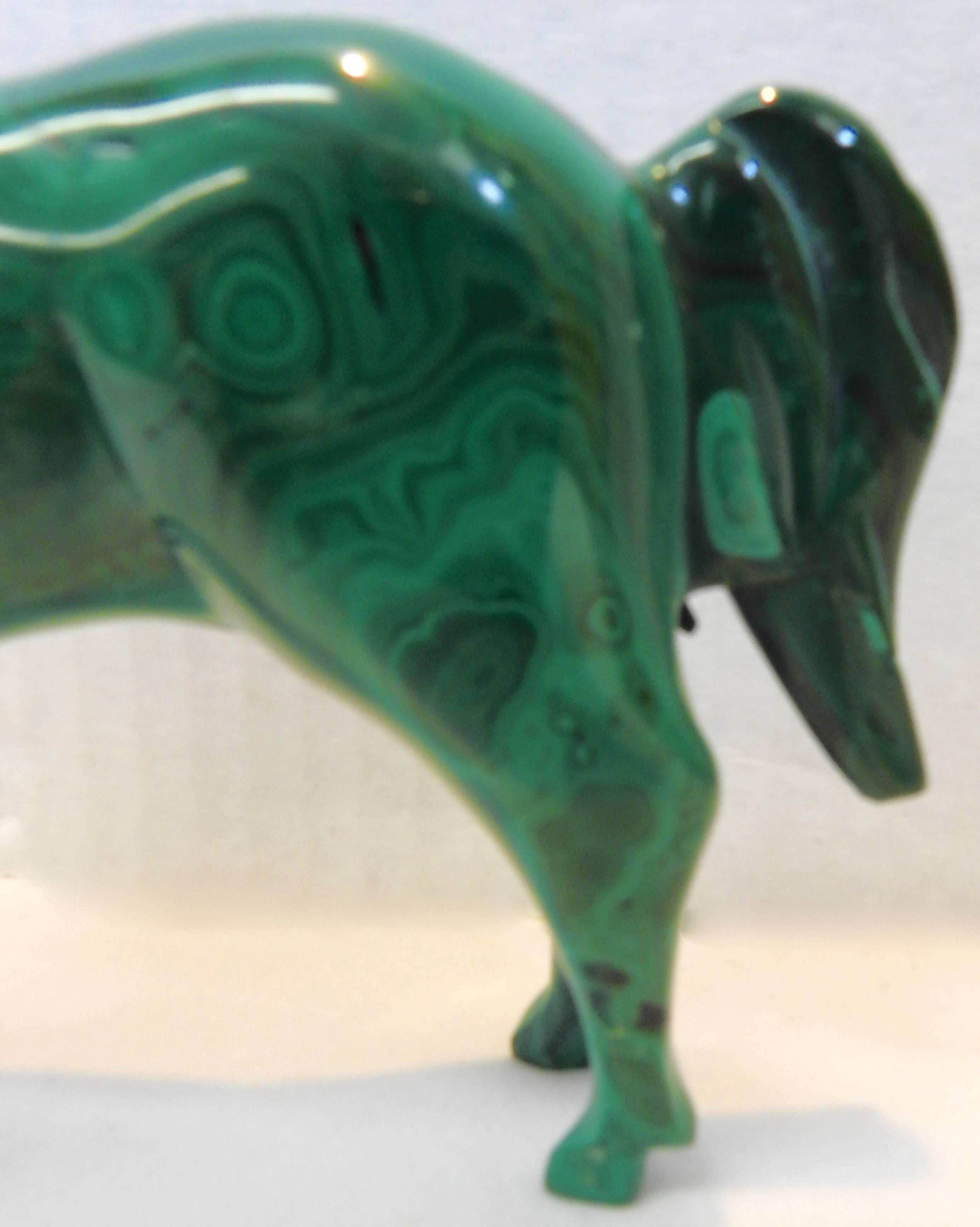 This stately horse with a flowing mane stands tall in beautiful green Malachite. He is from the midcentury era and is hand-carved.