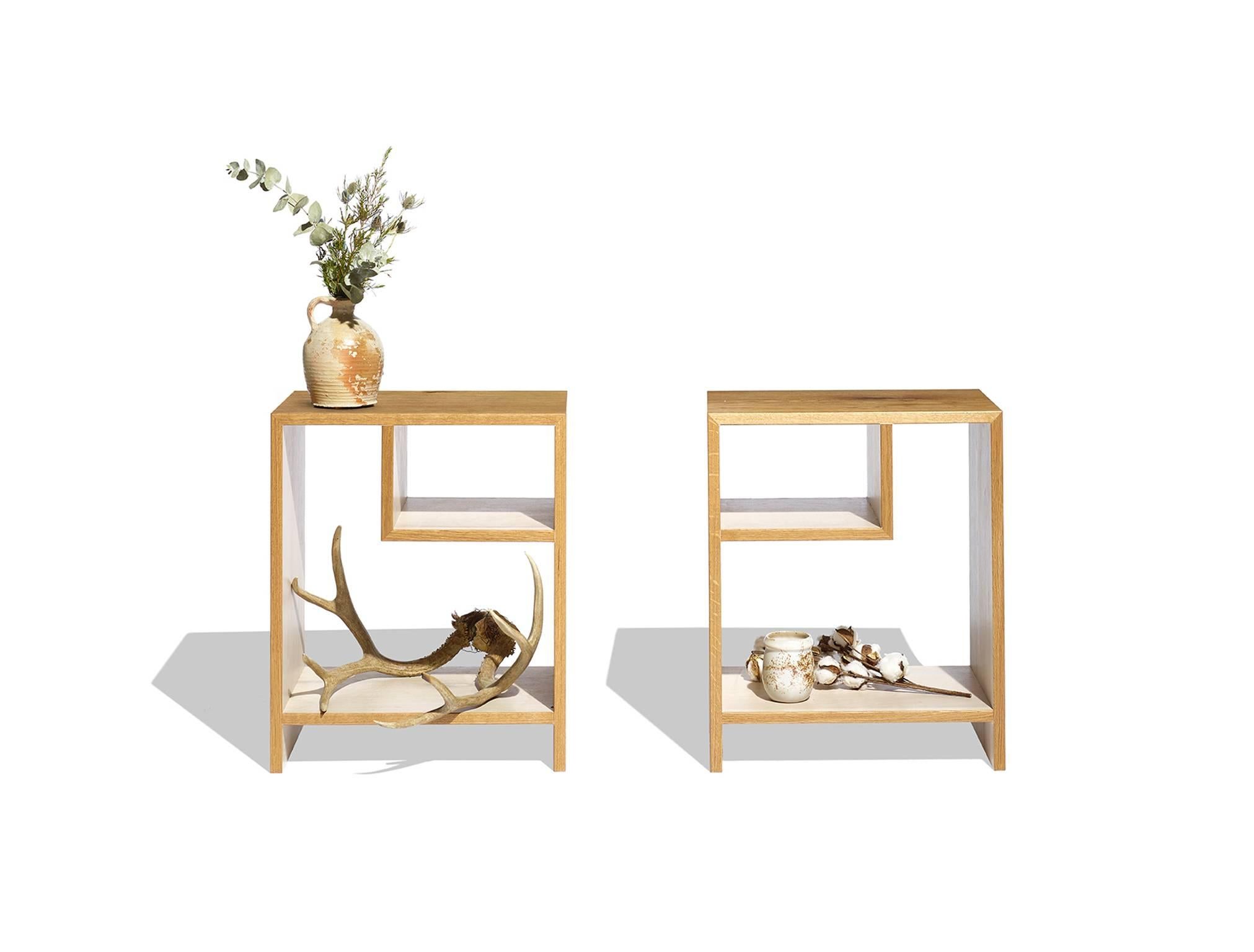 The light and airy Pocket side tables are perfect for the living room, bedside, or lounge. Made in natural and bone white oak, the Pocket tables provide a minimalistic display or storage option. The Pocket is part of a new series by Alexis Moran,