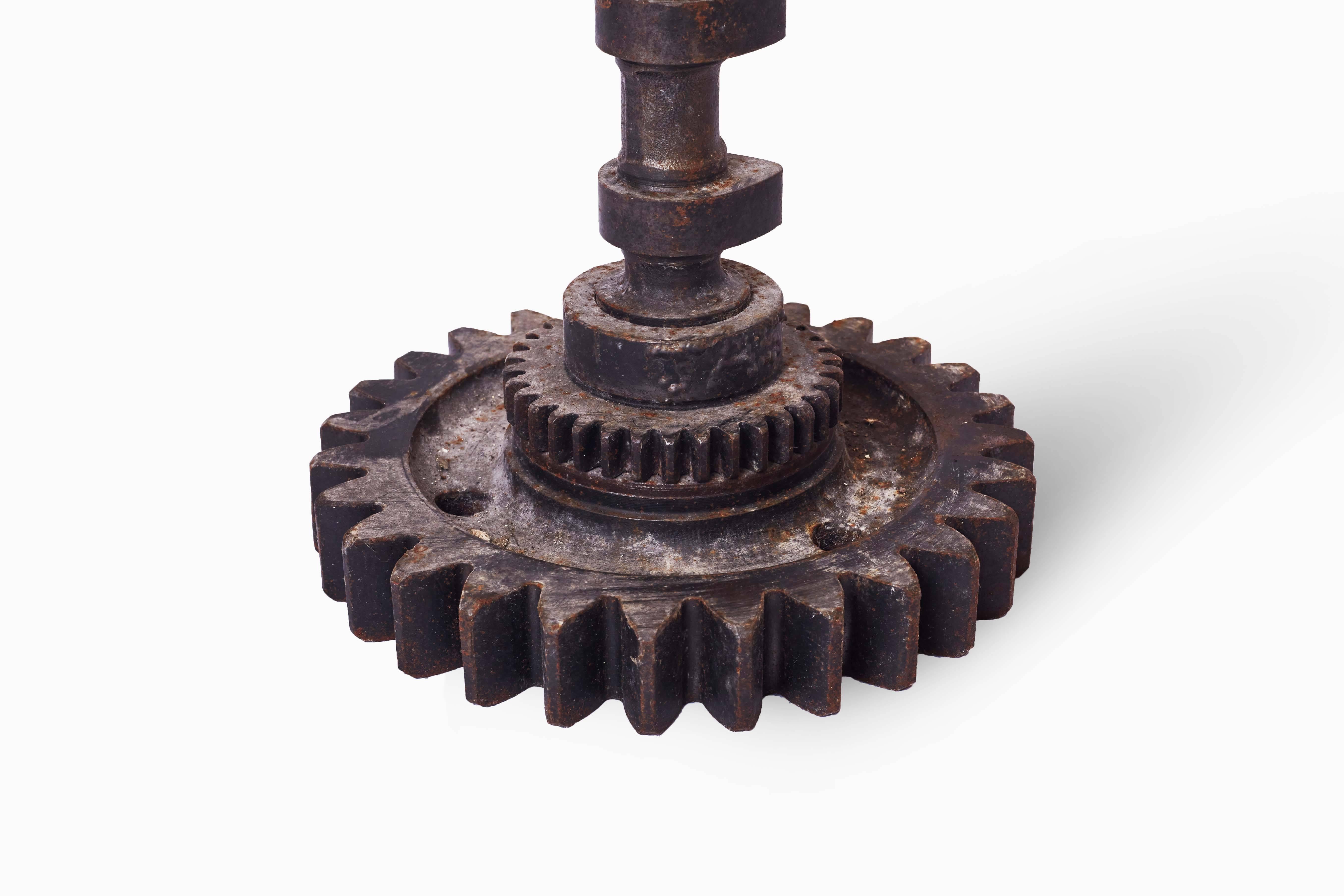 Brutalist candleholder created from recycled spare parts of old machinery found in Indonesia.