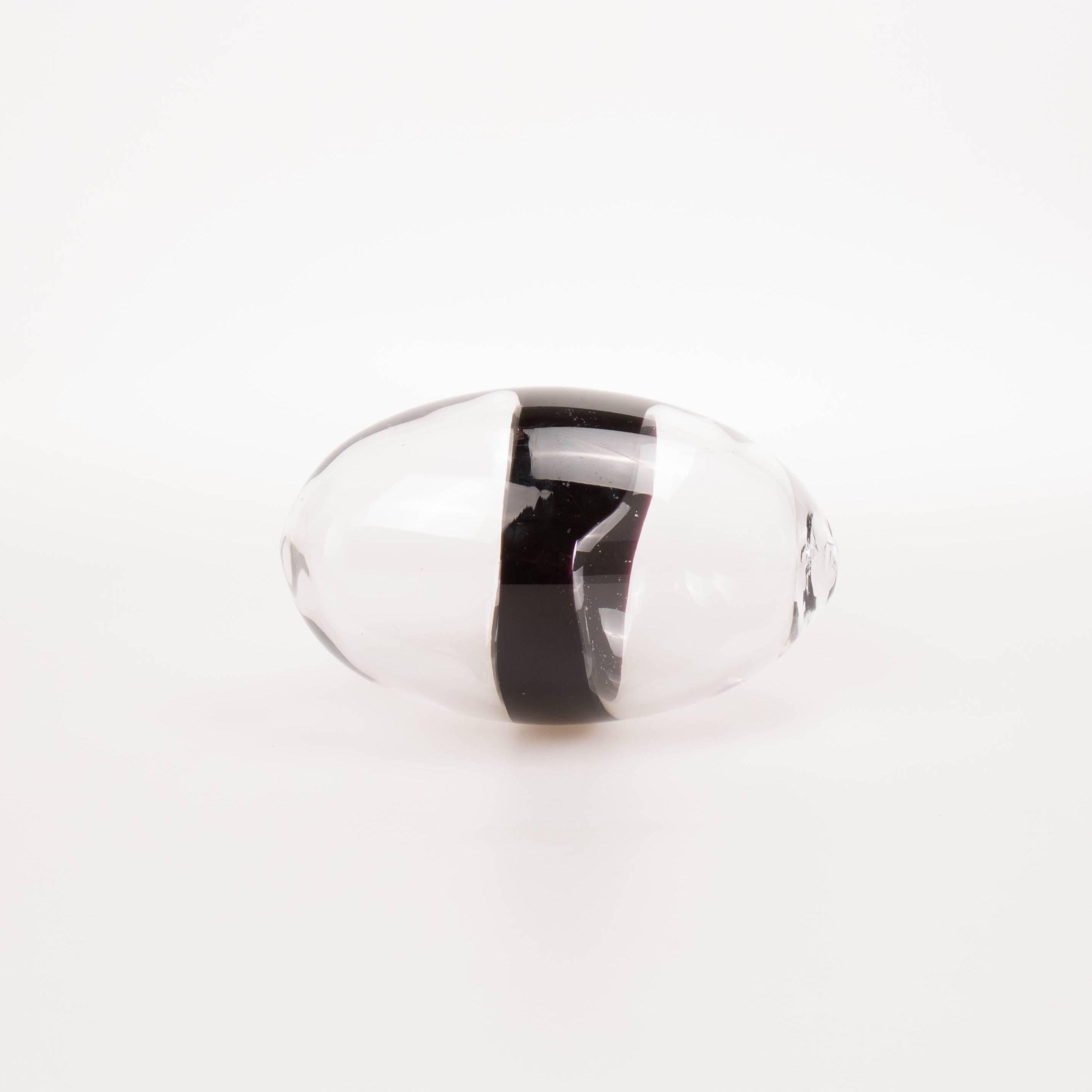 Clear glass egg form with black irregular horizontal band designed by? Ludovico Diaz de Santillana for Venini for Pierre Cardin. Italian, late 1960s.