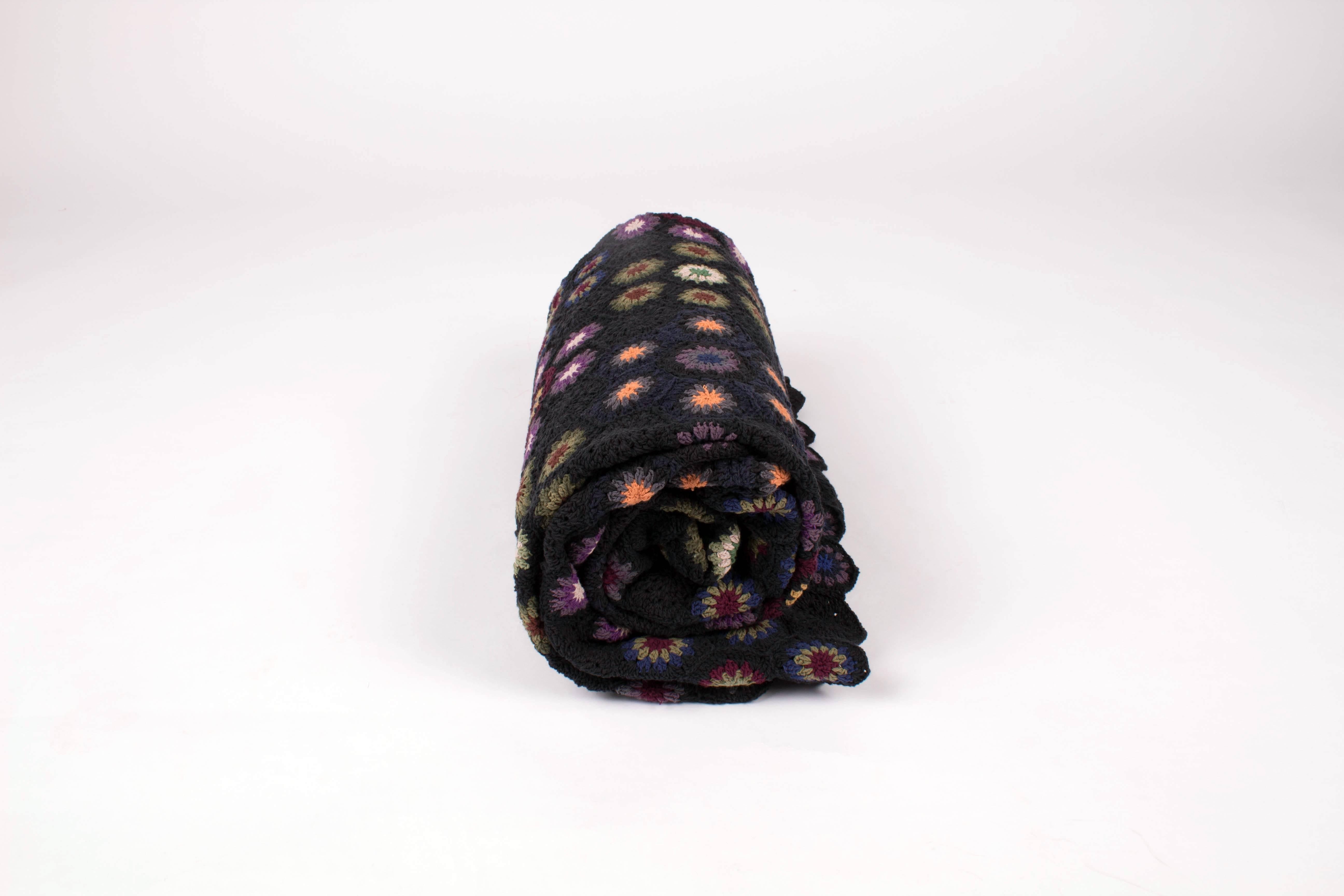 Crocheted medallion blanket designed by Kokon to Zai.