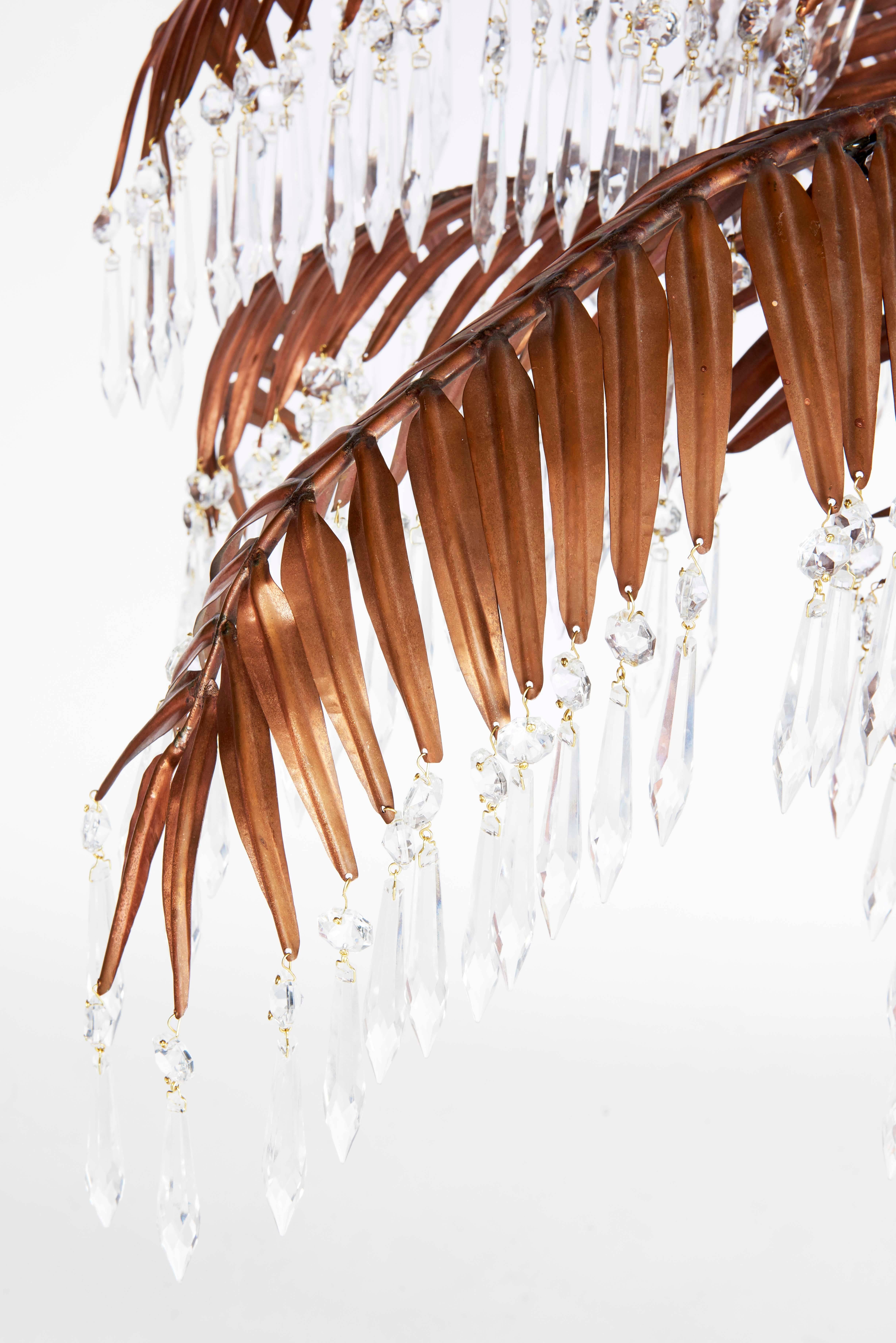 Handcrafted copper palm tree chandelier with czech crystal prisms.