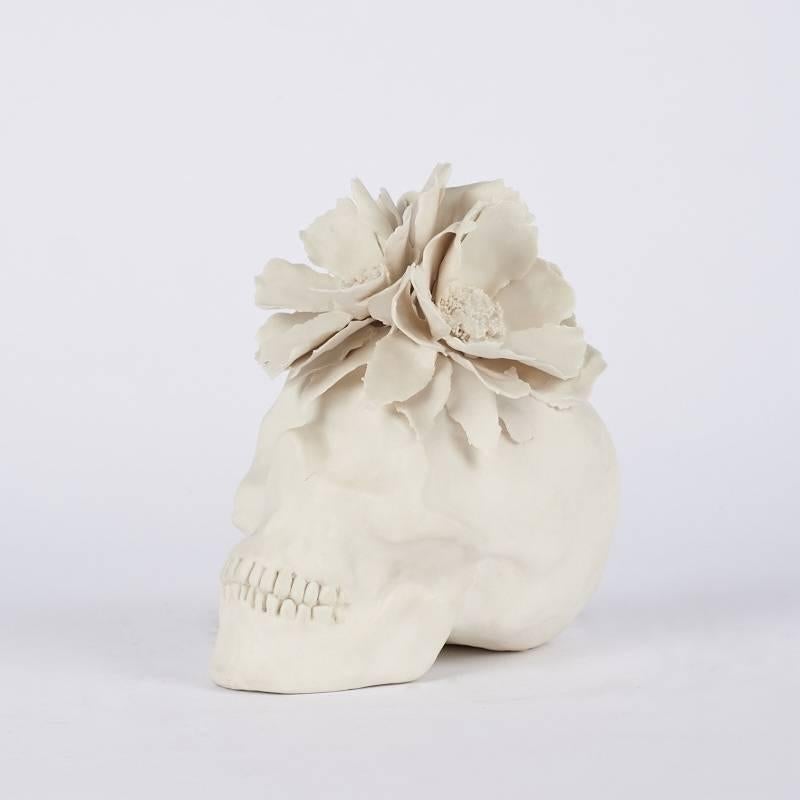 Ceramic artisanal skulls by artist Steven Geddes.

  