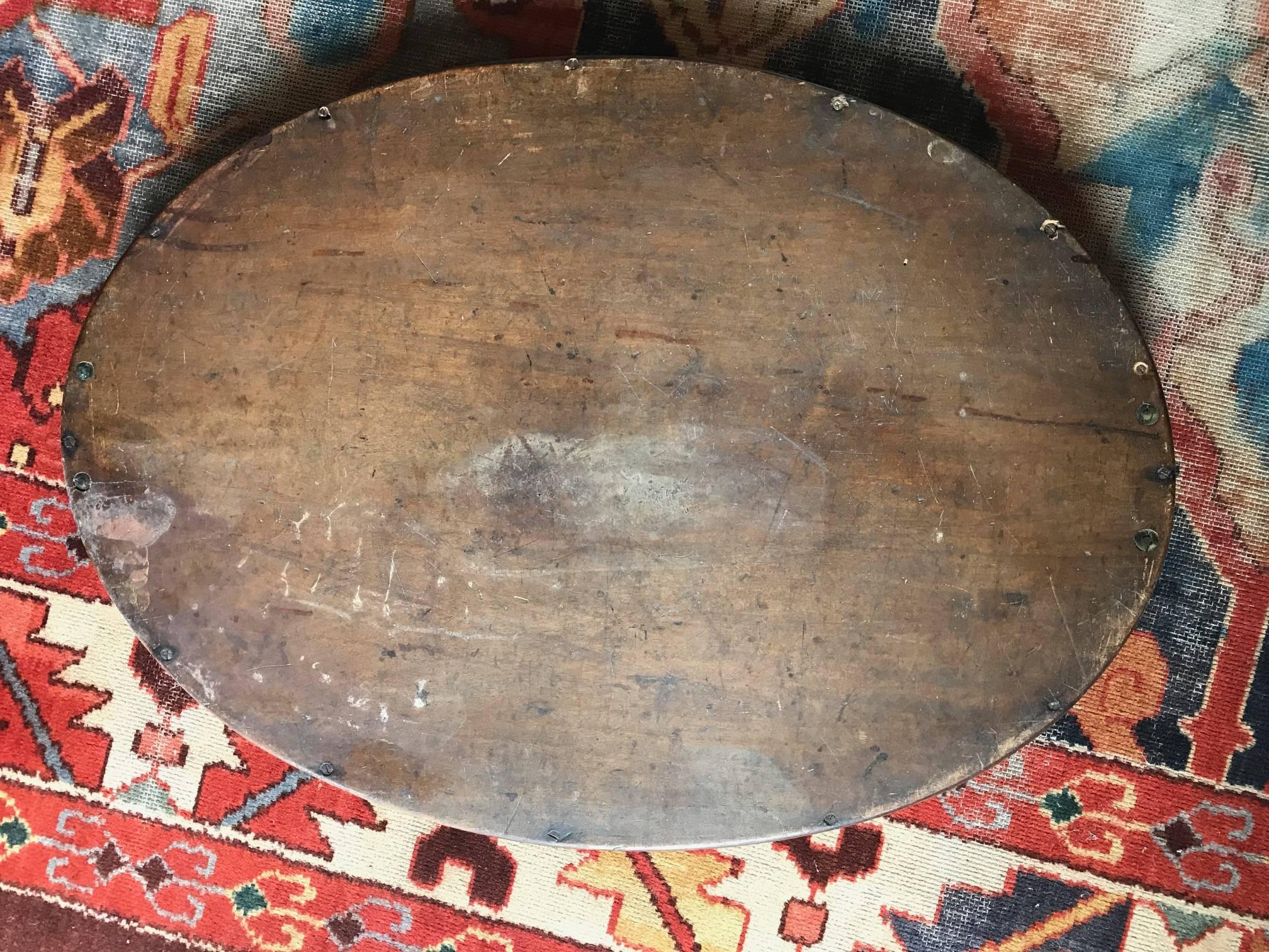 A wonderful early 19th century English Sheraton style oval tray. Painted with an idyllic provincial rural scene. Some signs of previous restoration. In very good condition.