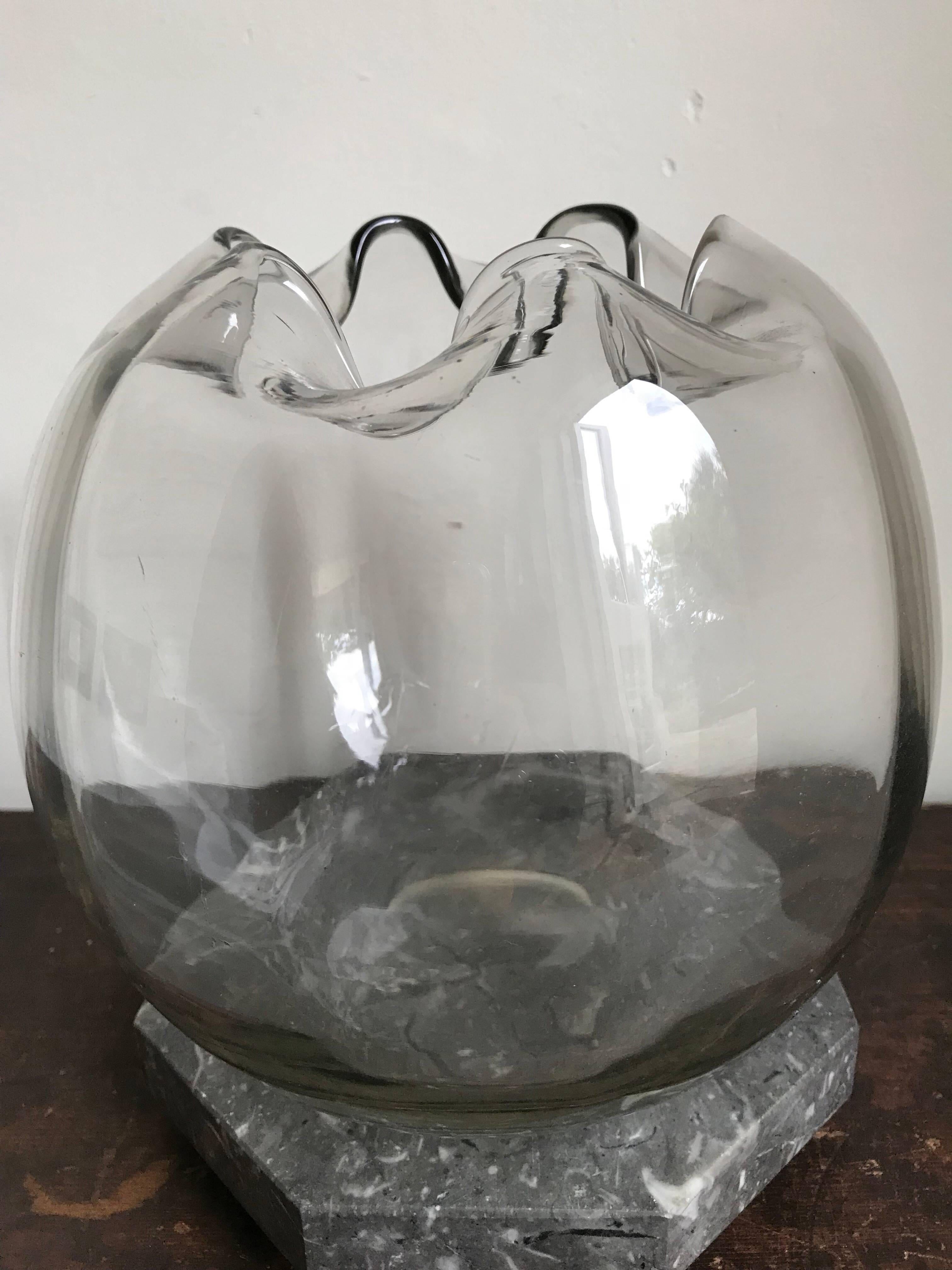A wonderful spherical handblown glass bowl with folded rim detail, French, circa 1930s.
