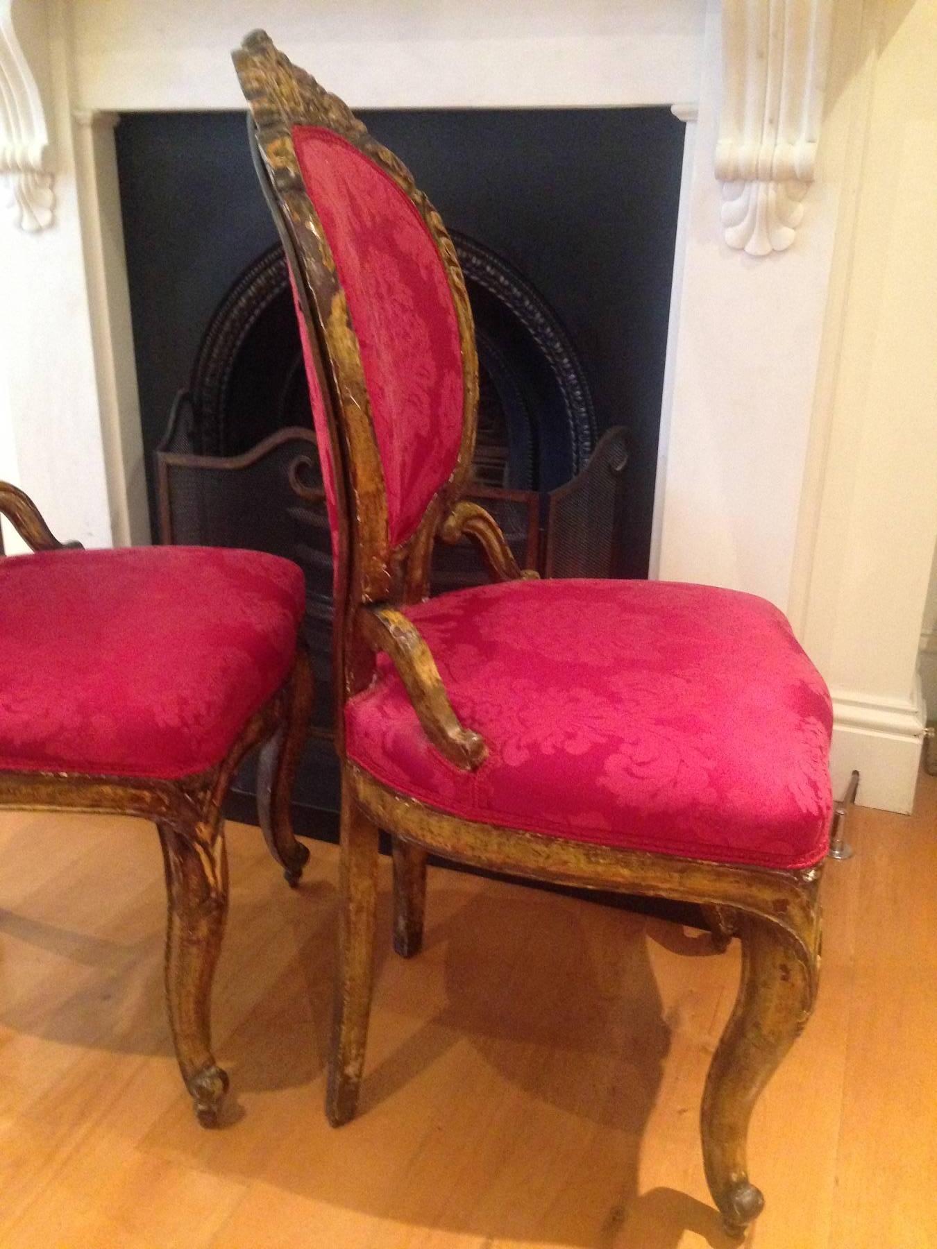 Baroque Revival Pair of 18th Century Italian Baroque Giltwood Chairs Upholstered in Damask For Sale