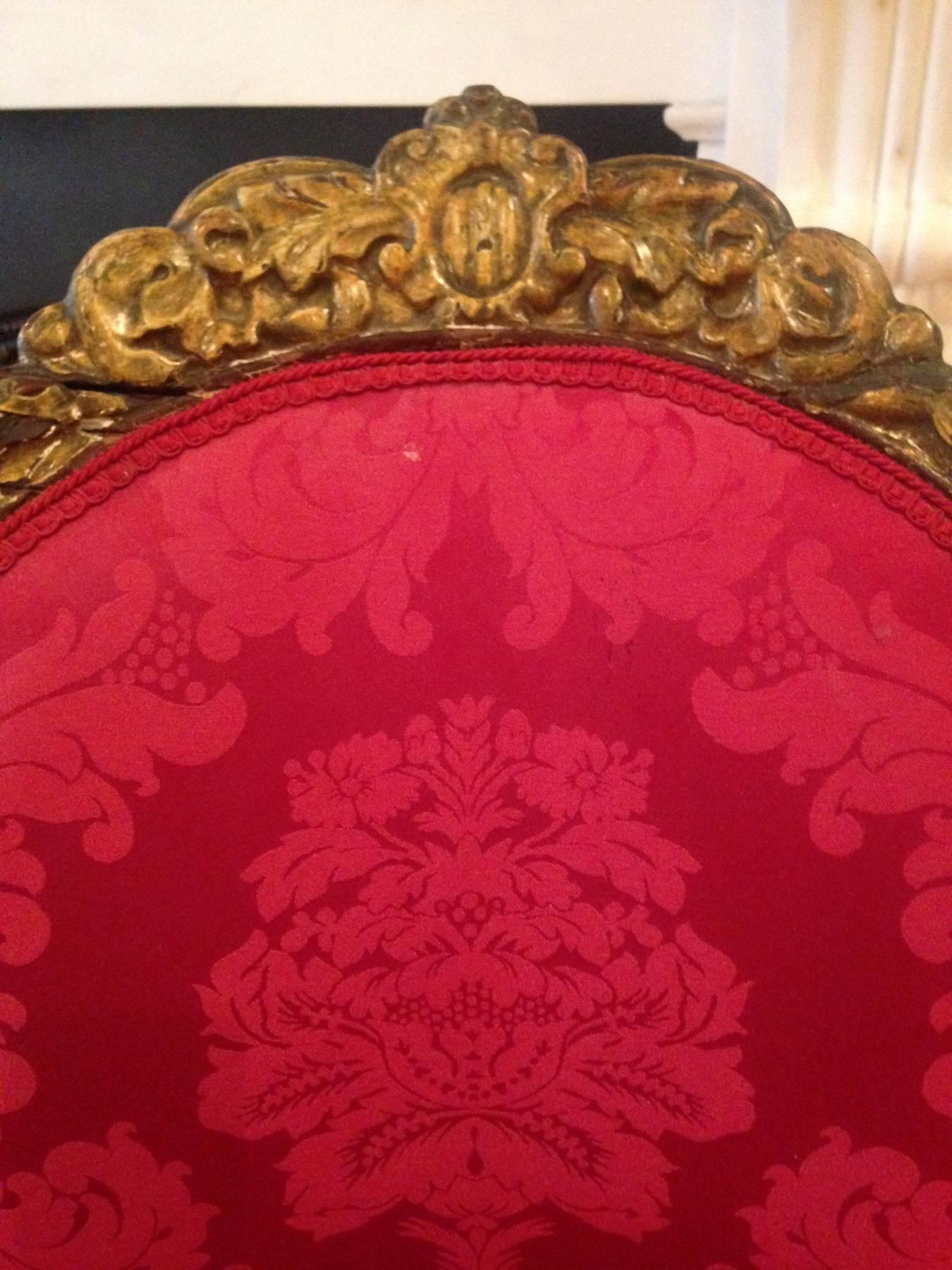 Carved Pair of 18th Century Italian Baroque Giltwood Chairs Upholstered in Damask For Sale