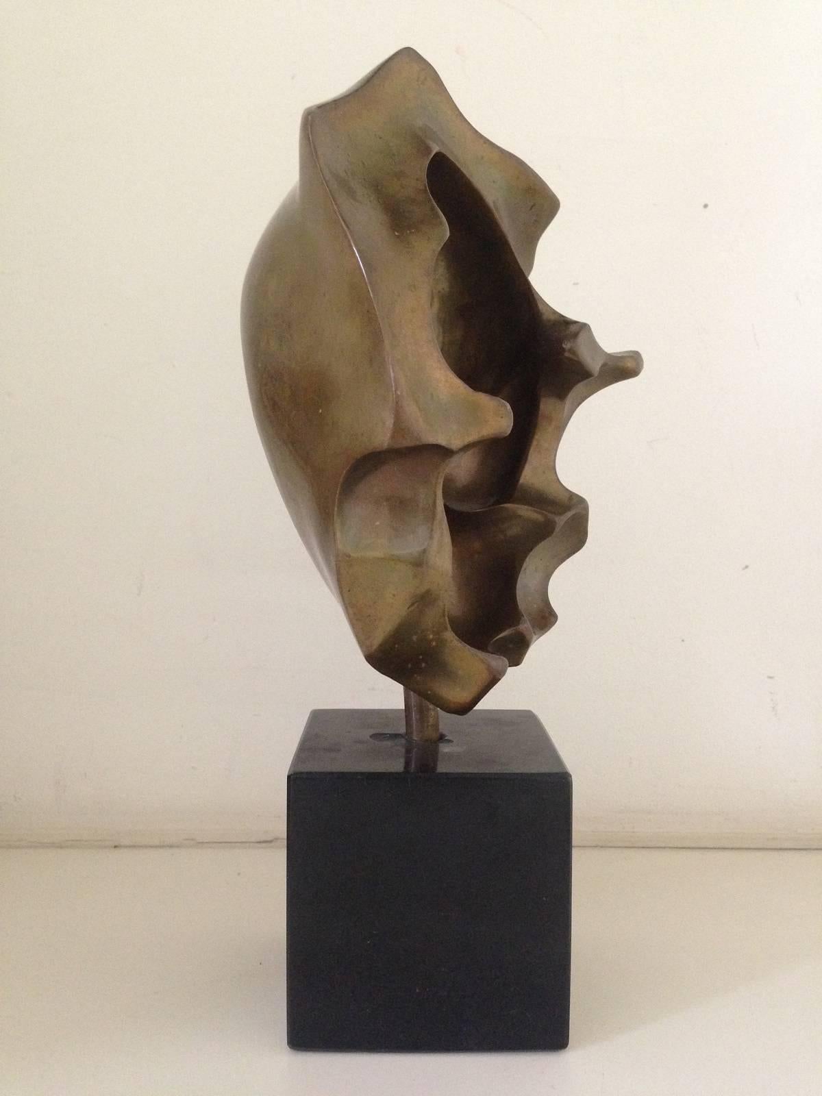 A beautiful and powerful small bronze abstract sculpture on black marble base by Francois Kovacs. Numbered 15/35 and signed Francois Kovacs. 
Kovacs was a Belgian Sculptor and artist, originally from Hungary. Born into a poor family, he began