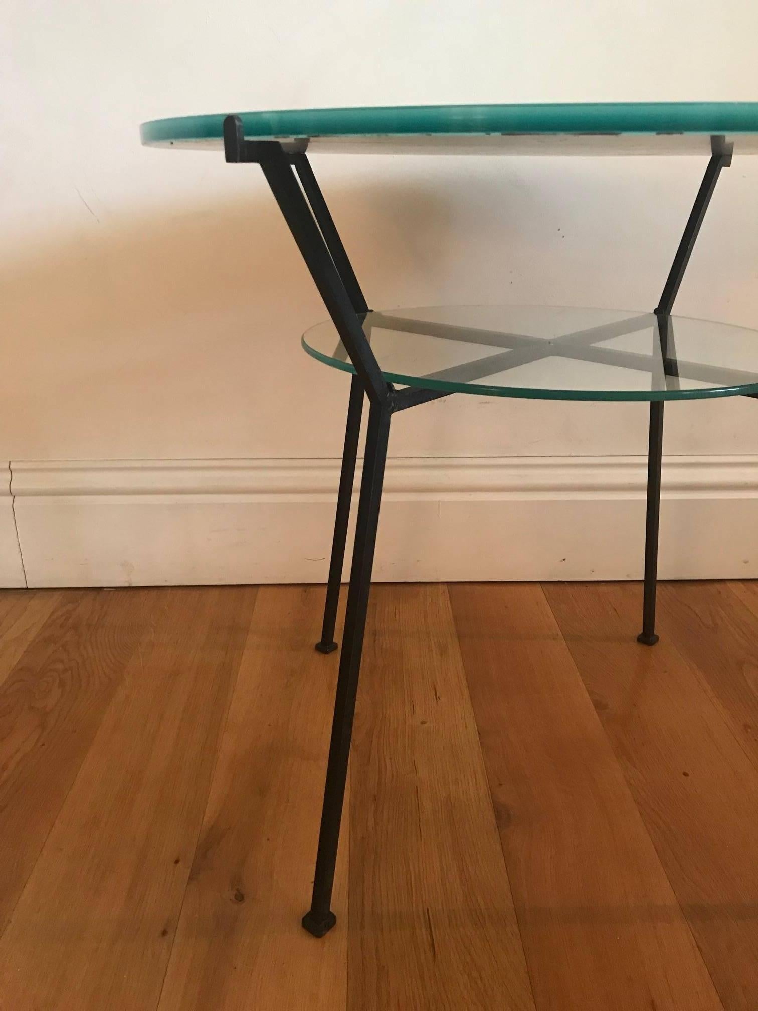A painted iron and clear glass and frosted glass (both replaced) side table by the French, 20th century designer Charles Ramos.