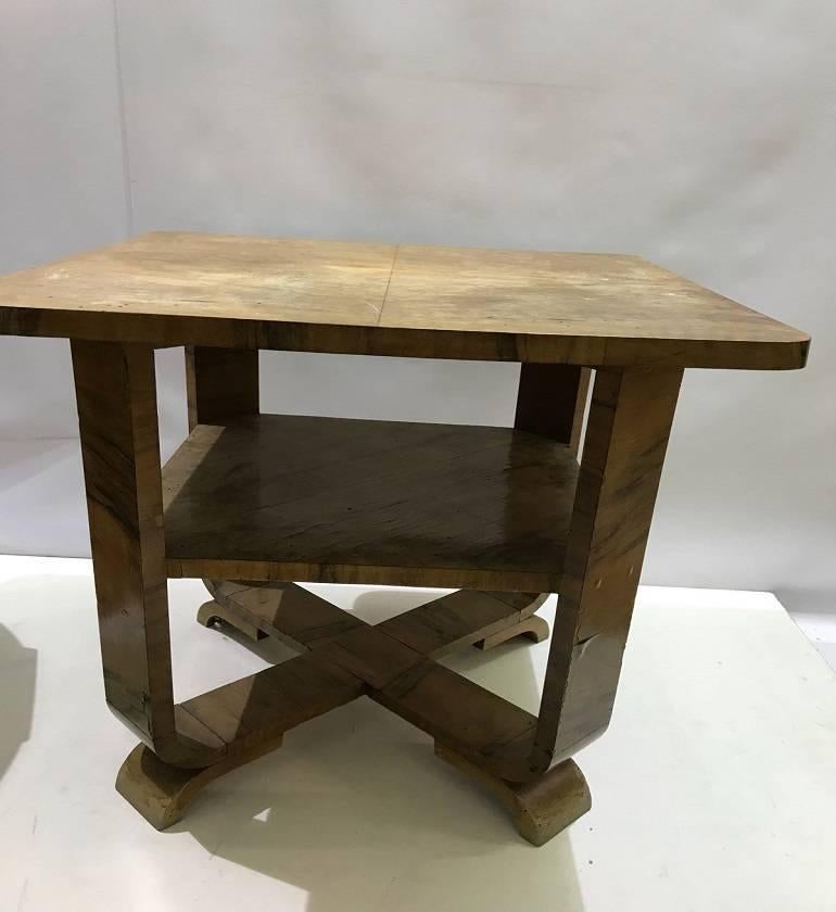 
Beautiful coffee table in 1930 Art Deco coffee table with 2 shelves.