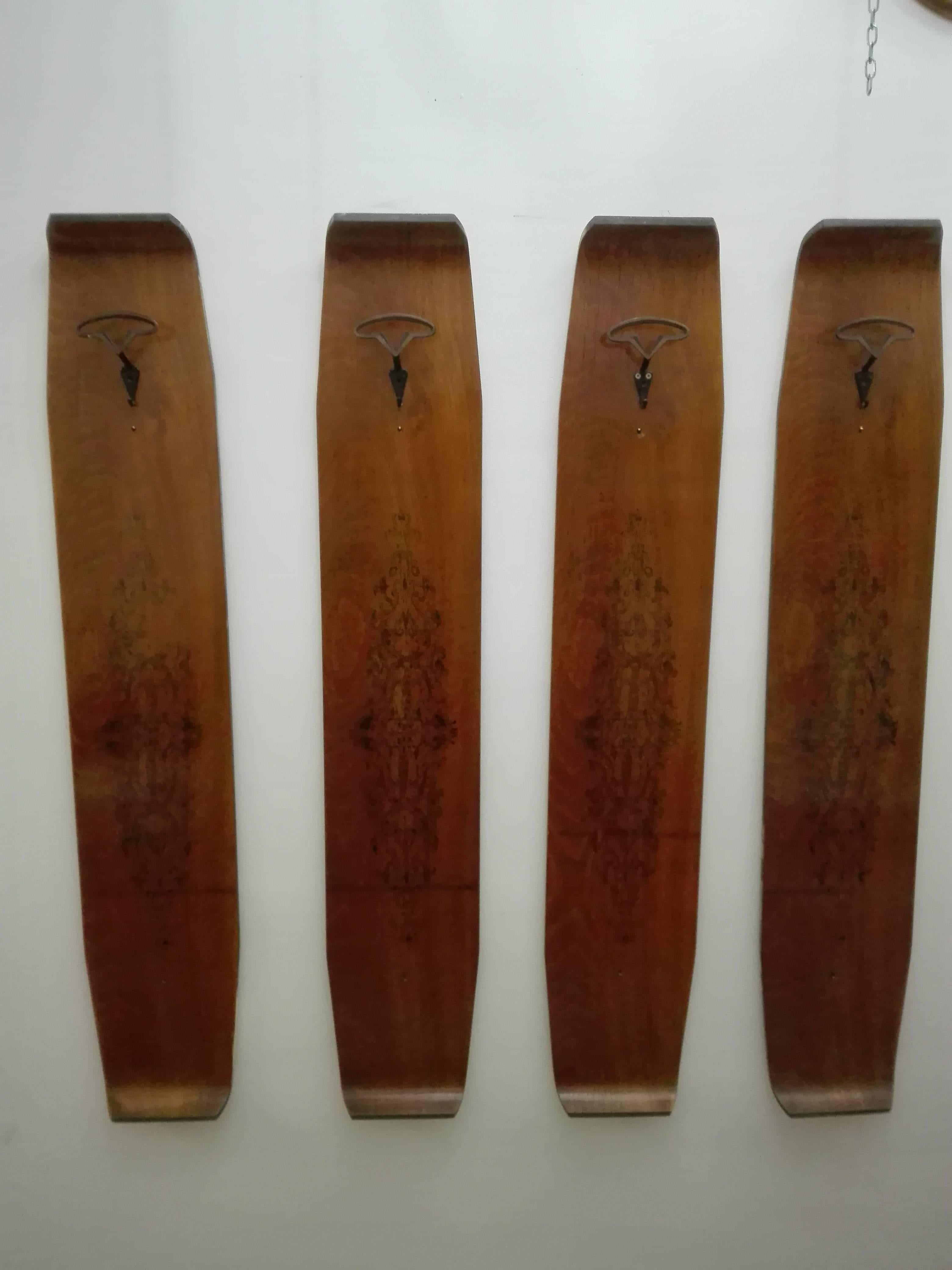 four elements in vintage teak hangers with montable designs also staggered great for making games on the wall attribution Campo e Graffi 
measures for each panel
height 140 cm
width 24 cm
depth 7 cm