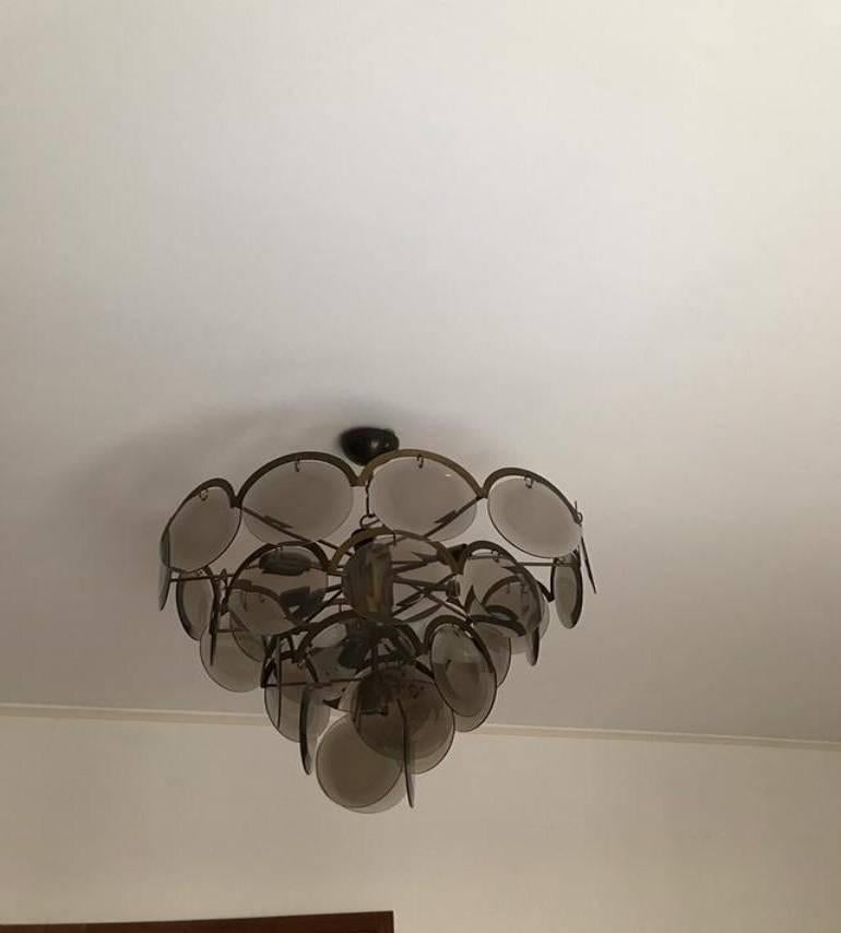 These splendid Vistosi chandeliers are in excellent condition and look incredibly glamorous both on and off. These offer a substantial scale and create a true visual impact with their 63 cm diameter and 48 cm frame height. Even light for their size,