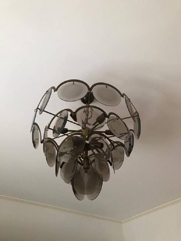 Mid-Century Modern Chandelier at five levels in chromed metal and smoke glass, Italy, 1970s For Sale