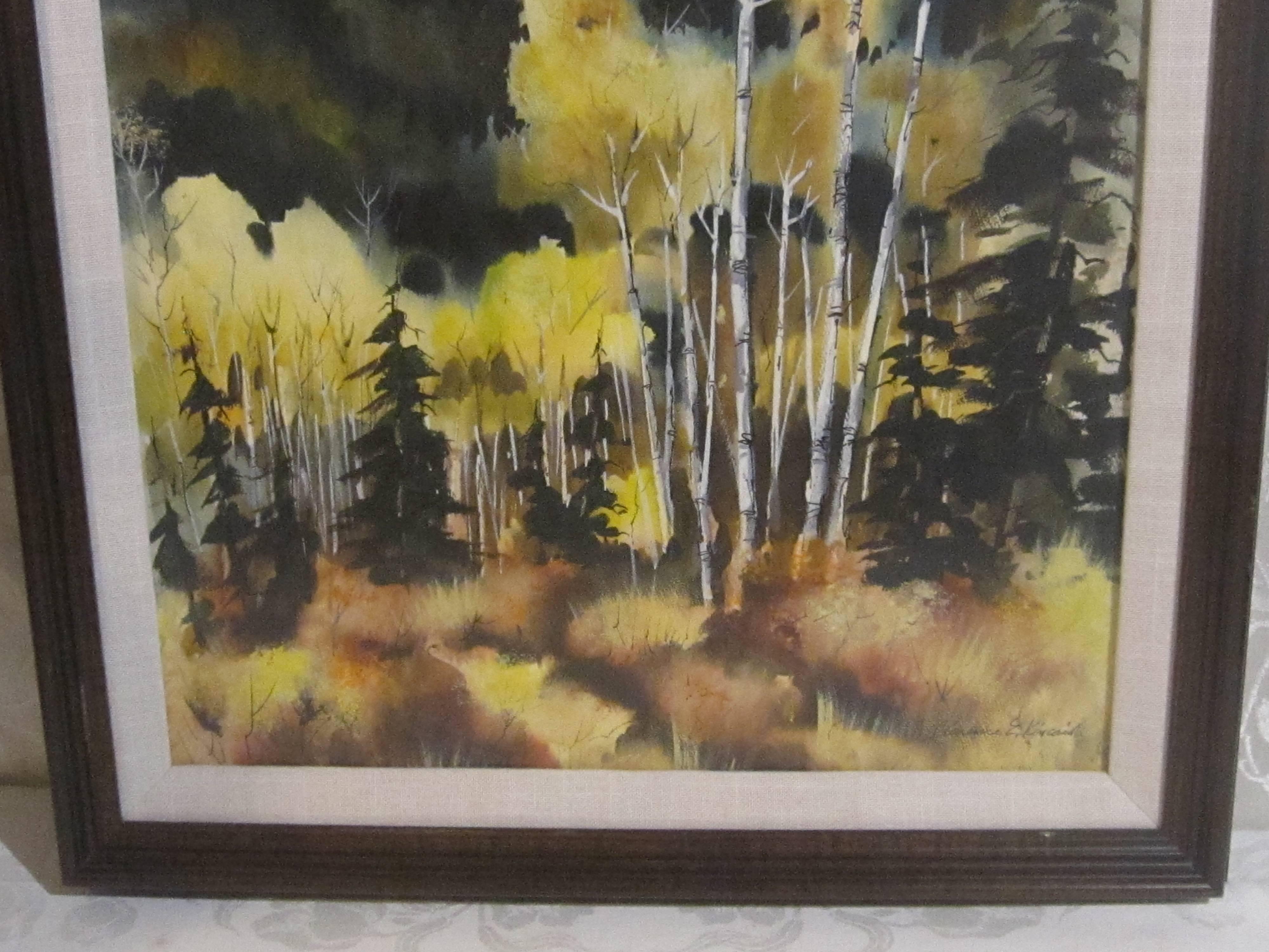 This is an original watercolor by Clarence Kincaid and signed in the lower right corner. It is a mountain scene depicting Aspens in the foreground. It is framed under non-glare glass.