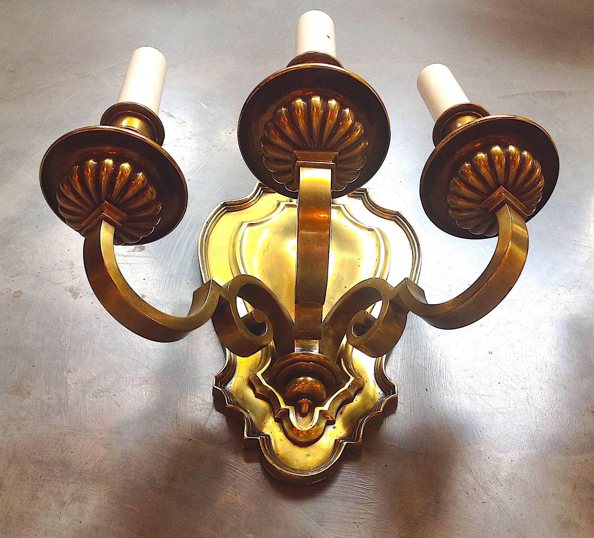 Edwardian Pair of Three-Light Cast Brass Shield Back Wall Sconces For Sale