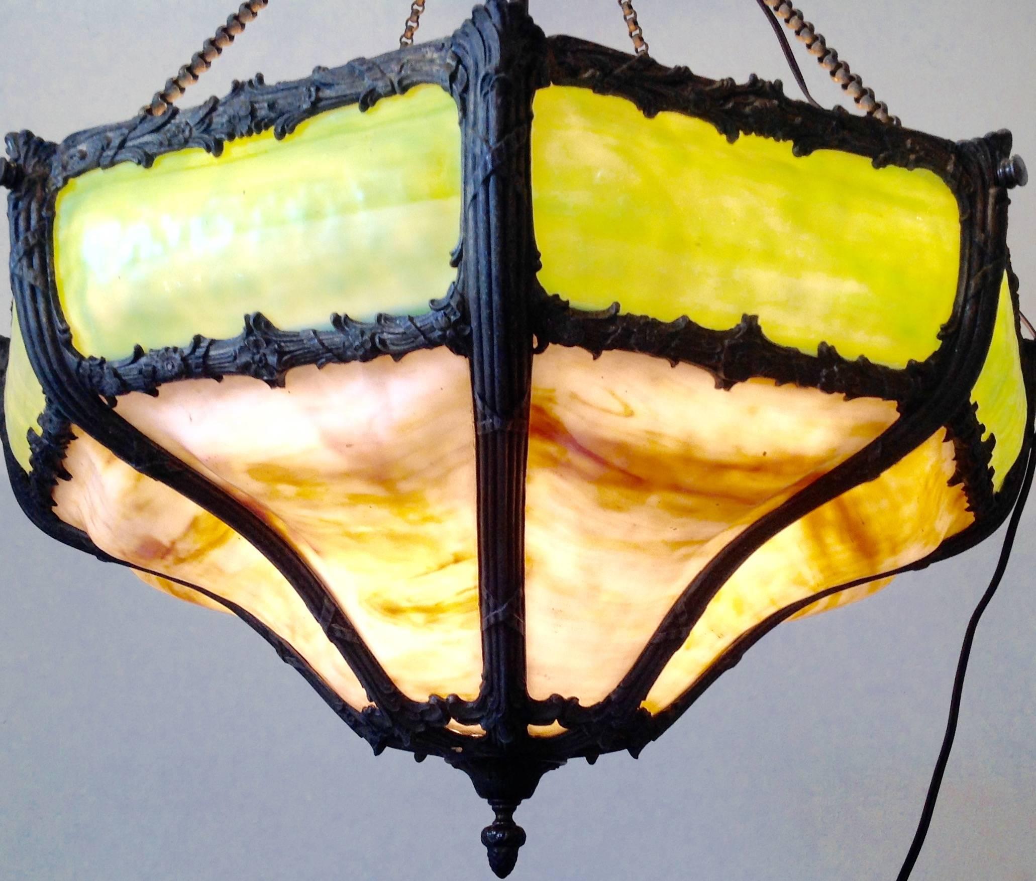 Vintage Puffy slag glass hanging shade with four-light cluster and original antique brass chain. Originally gas. Restored and wired to UL standards.