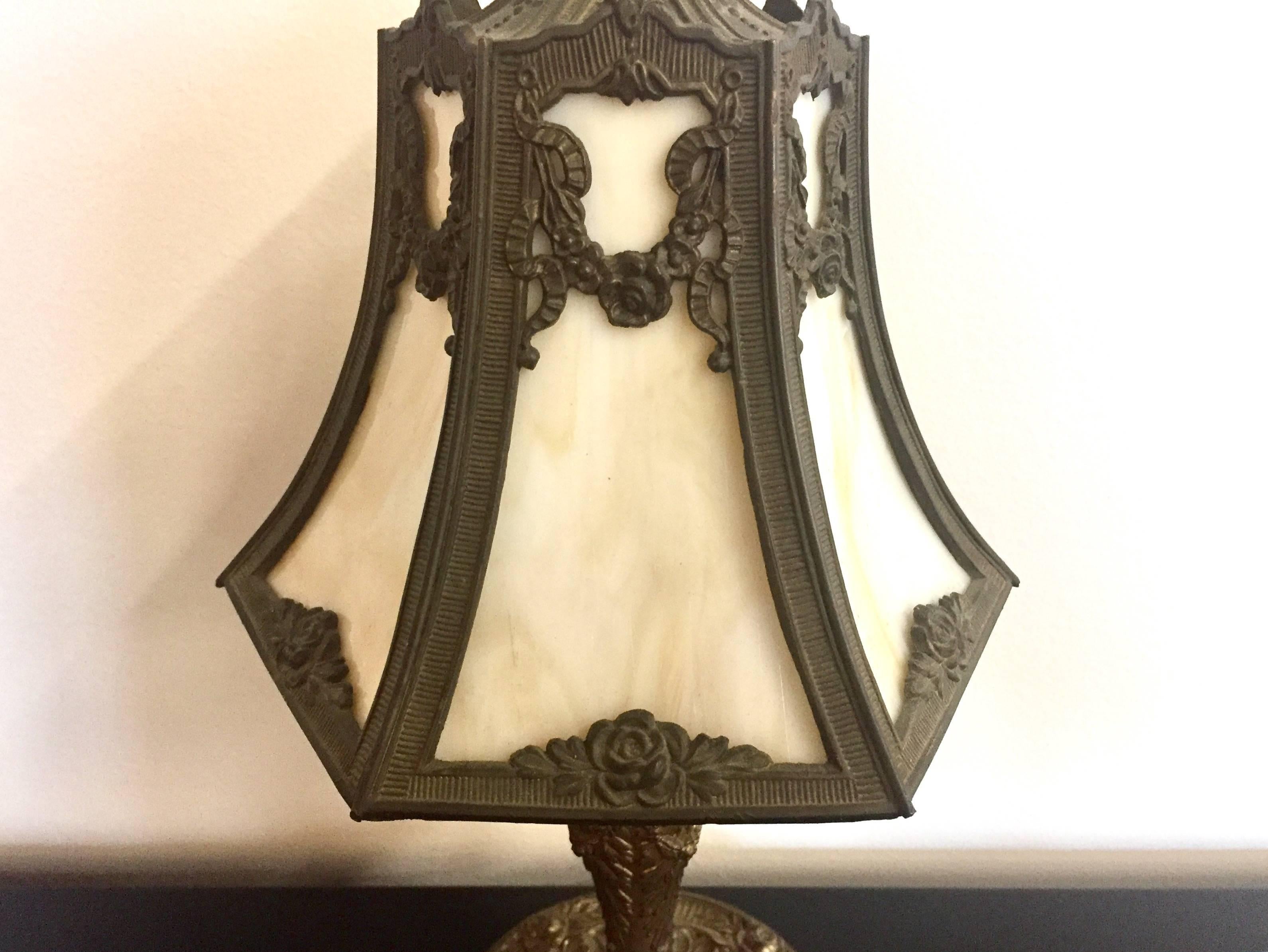 Vintage 1920s Boudoir lamp with slag glass shade and ornate rose garden design. Perfect for dressing table or bedside table. Has been rewired to UL standards. Measures 8 inches wide and 14.5 inches high.