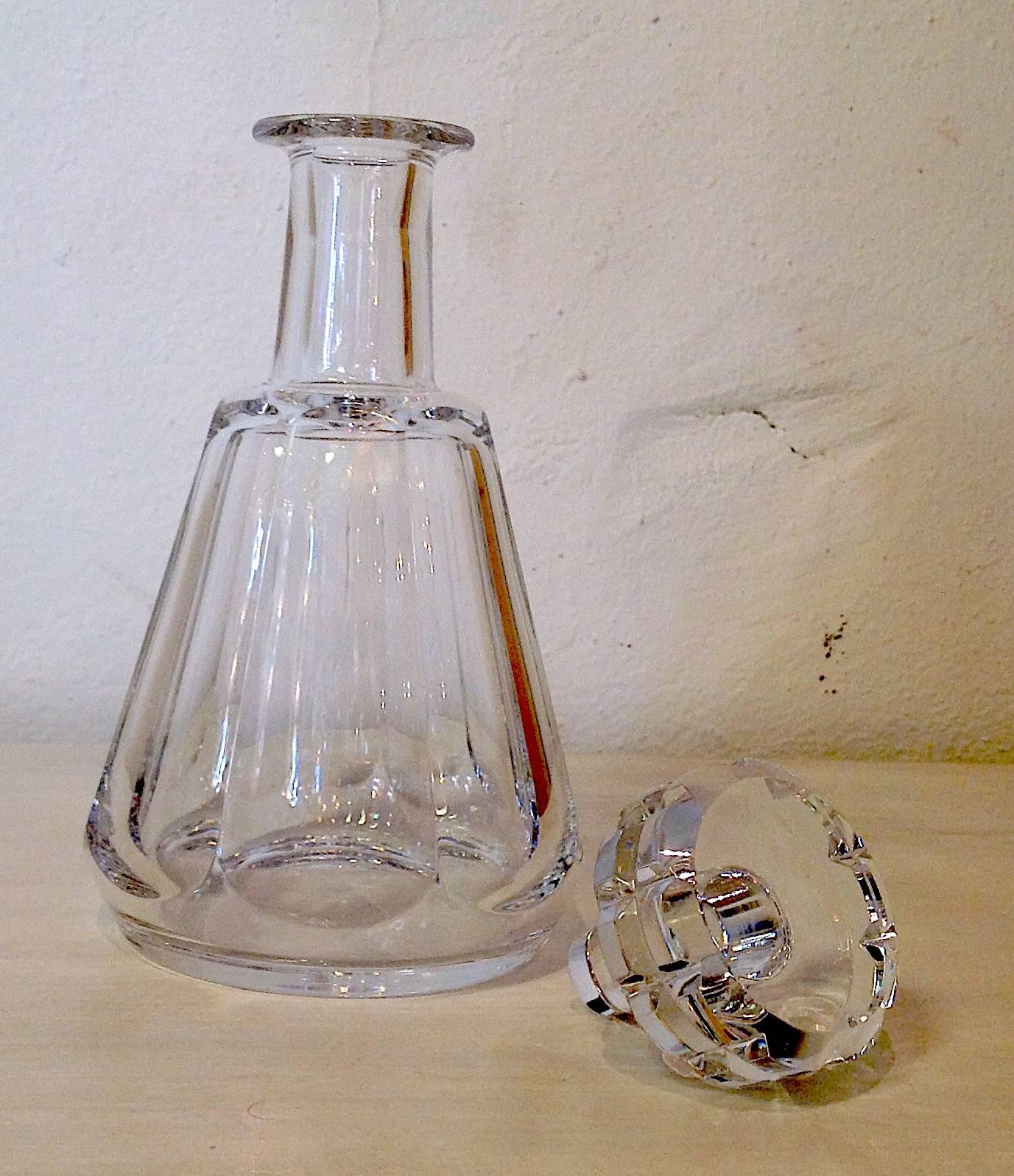Antique Baccarat crystal French paneled cordial decanter and stopper in Tallyrand pattern, measures 9.5 inches high and 5 inches wide. Beautiful French paneled cut. Excellent condition. Etched on bottom with Baccarat signature.