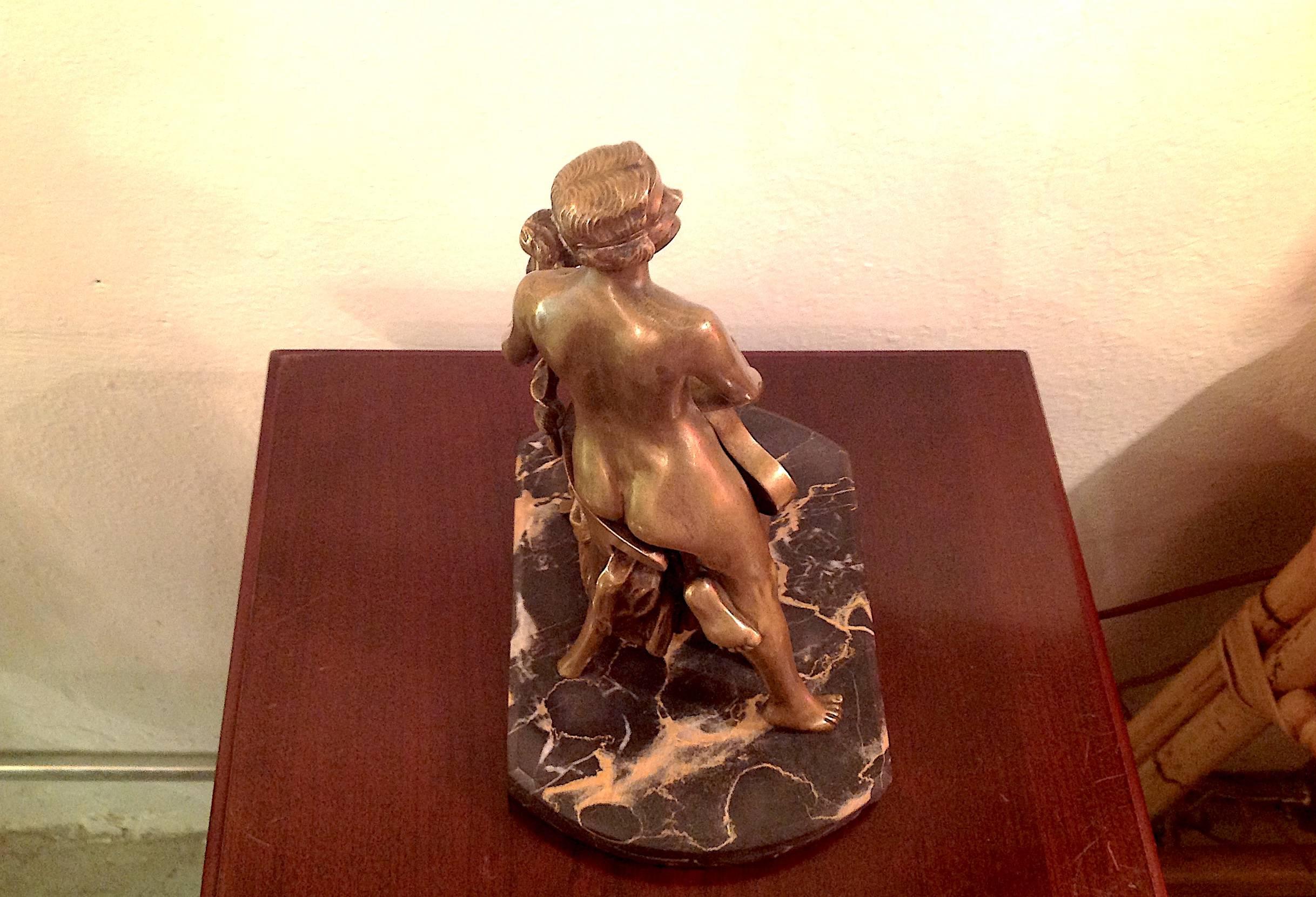Mid-19th century Art Nouveau, French bronze nude woman with guitar and mask sculpture. Cast in 2 pieces, marble base, original handmade square nuts, measures 9 inches high and 6.5 inches wide. Artist unknown.