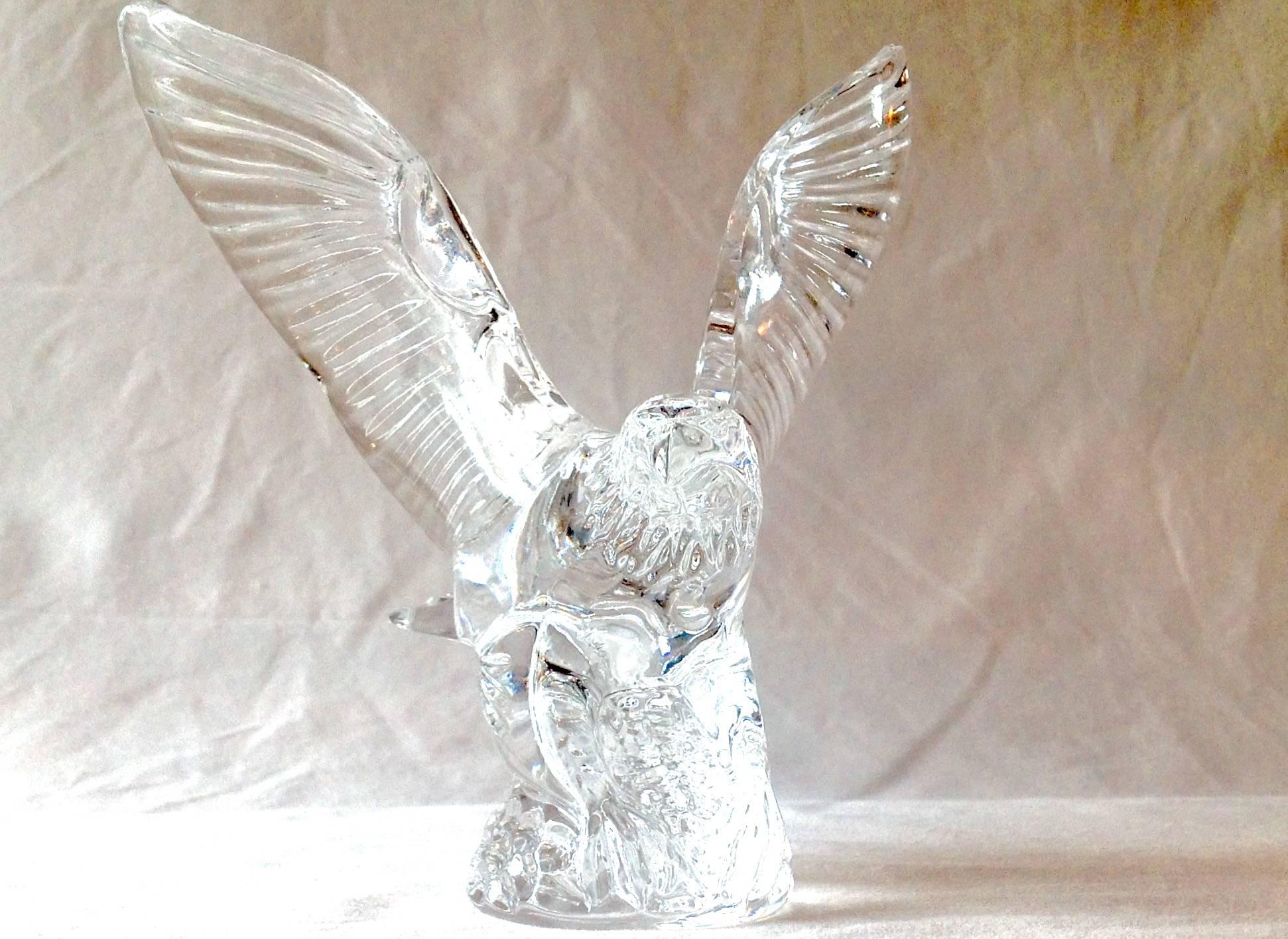Signed waterford crystal eagle figurine, measures 6.5 inches wide and 7 inches high. Brilliant cut. Nice desk accessory or shelf display piece.