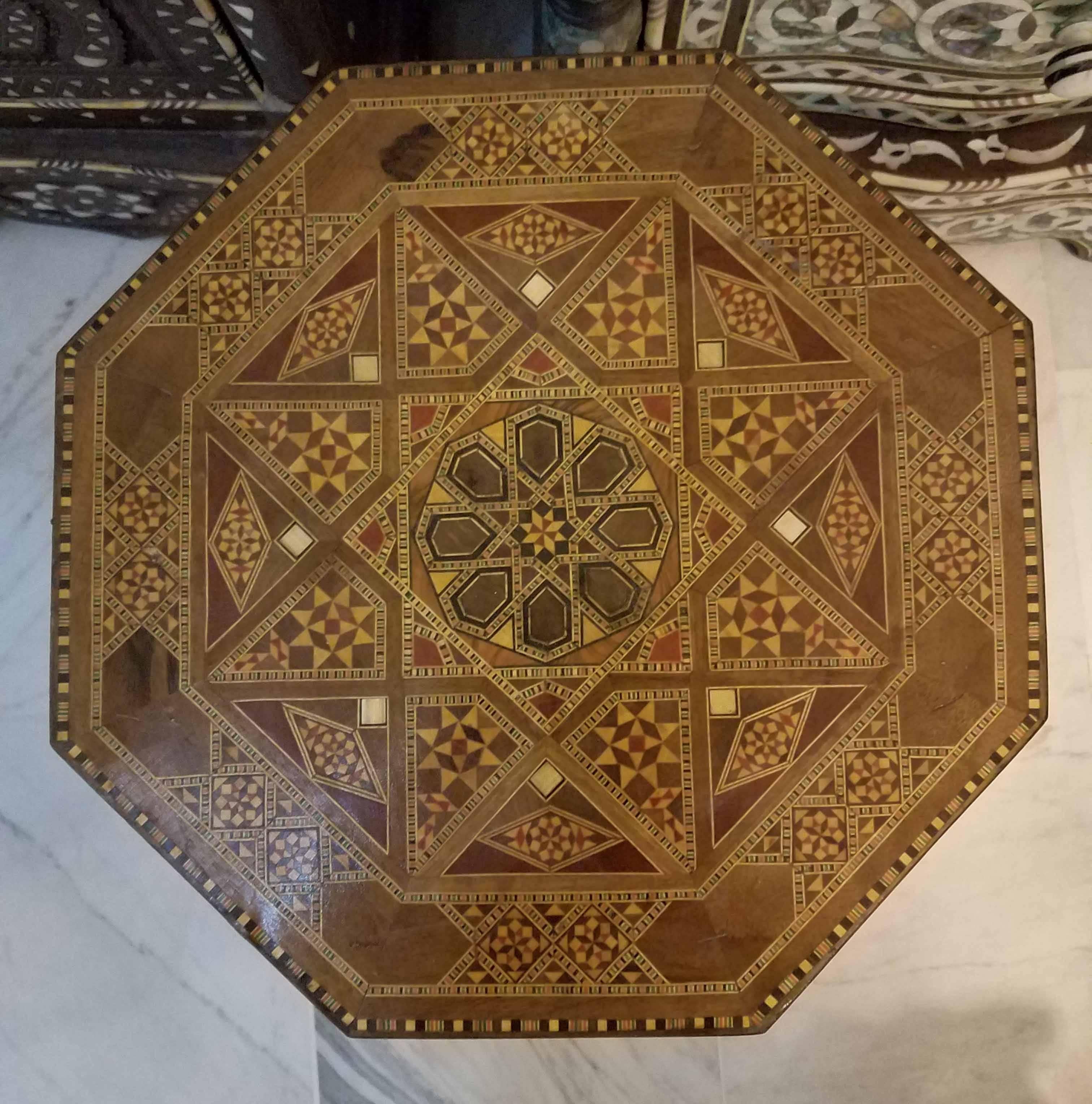 Gorgeous Syrian style marquetry side table made in Morocco. Walnut wood. Approximately 19" in height, and 14" in diameter. Great add-on or an accent piece to any décor, and any part of the house or office.
Must see to appreciate. Pictures