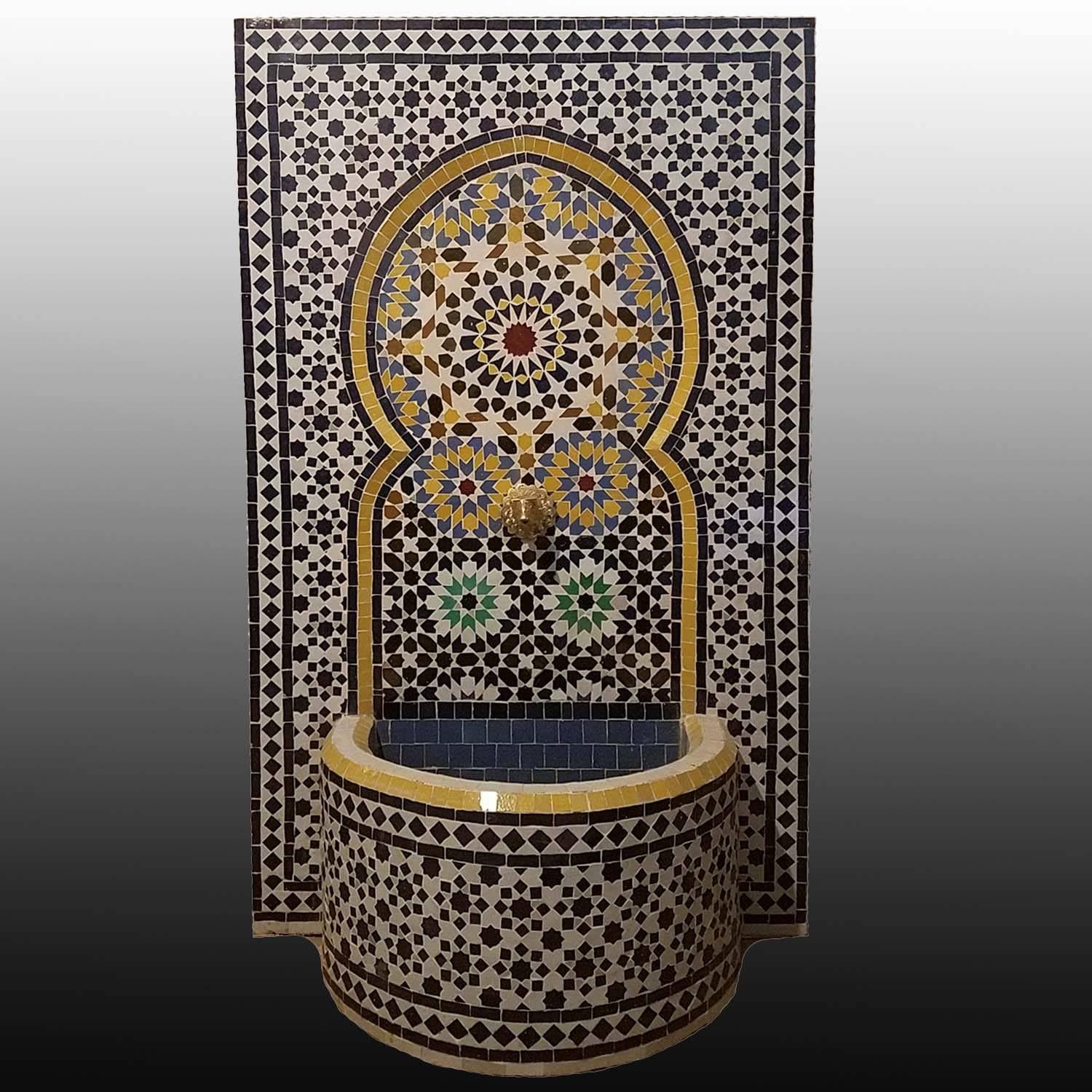 Moroccan glazed multicolored (Fez tradition) fountain made in Morocco. Measures approximately 50” high and 30” wide, and comes with a copper spout and short metal feet. Great for outdoors/indoors.
A small fountain pump is also included, to make