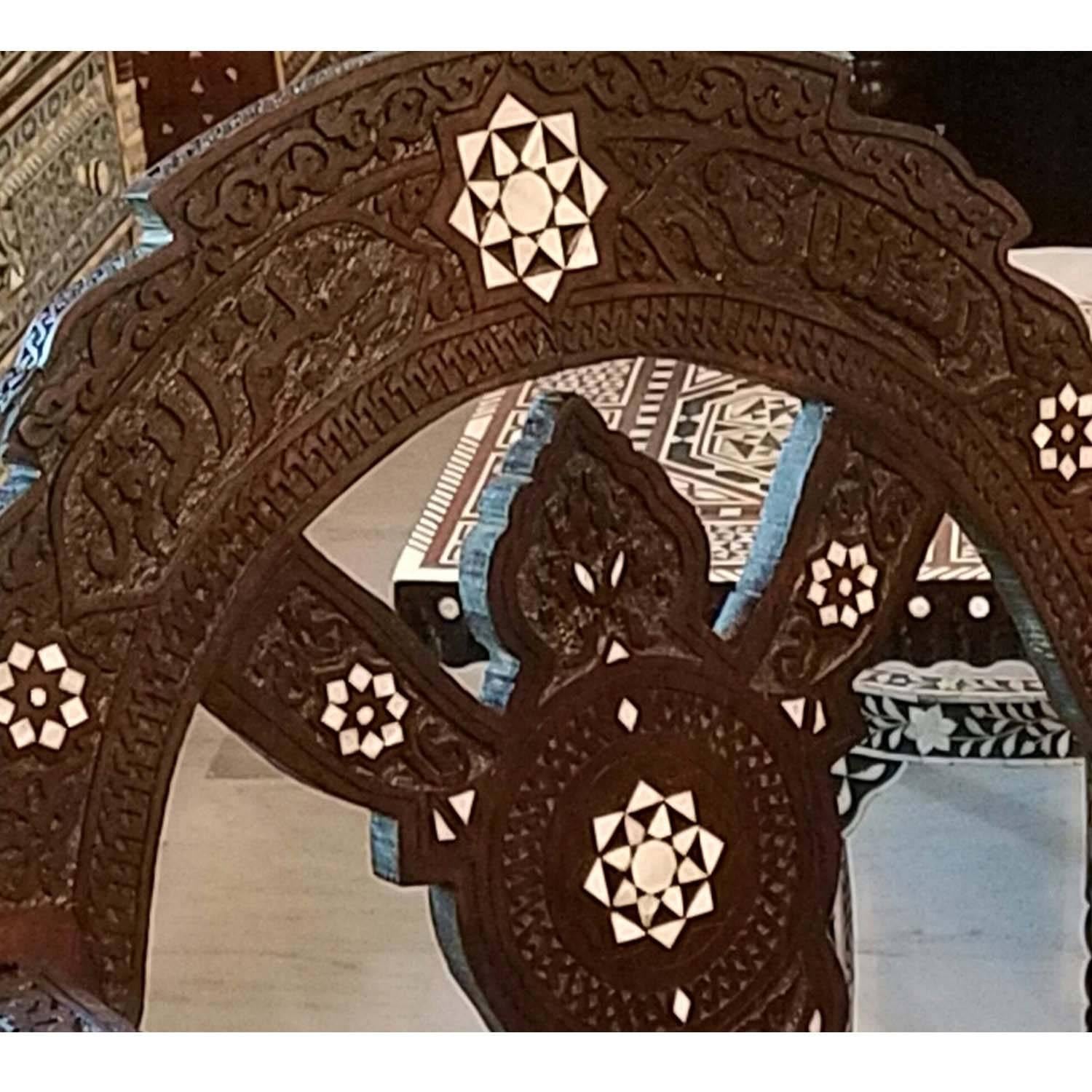 Very charming folding style Syrian chair hand-carved throughout with the most beautiful and intricate details of mother-of-pearl on solid walnut wood. Will be perfect as an accent piece for a dressing area, a power room, a bedroom or a living room.