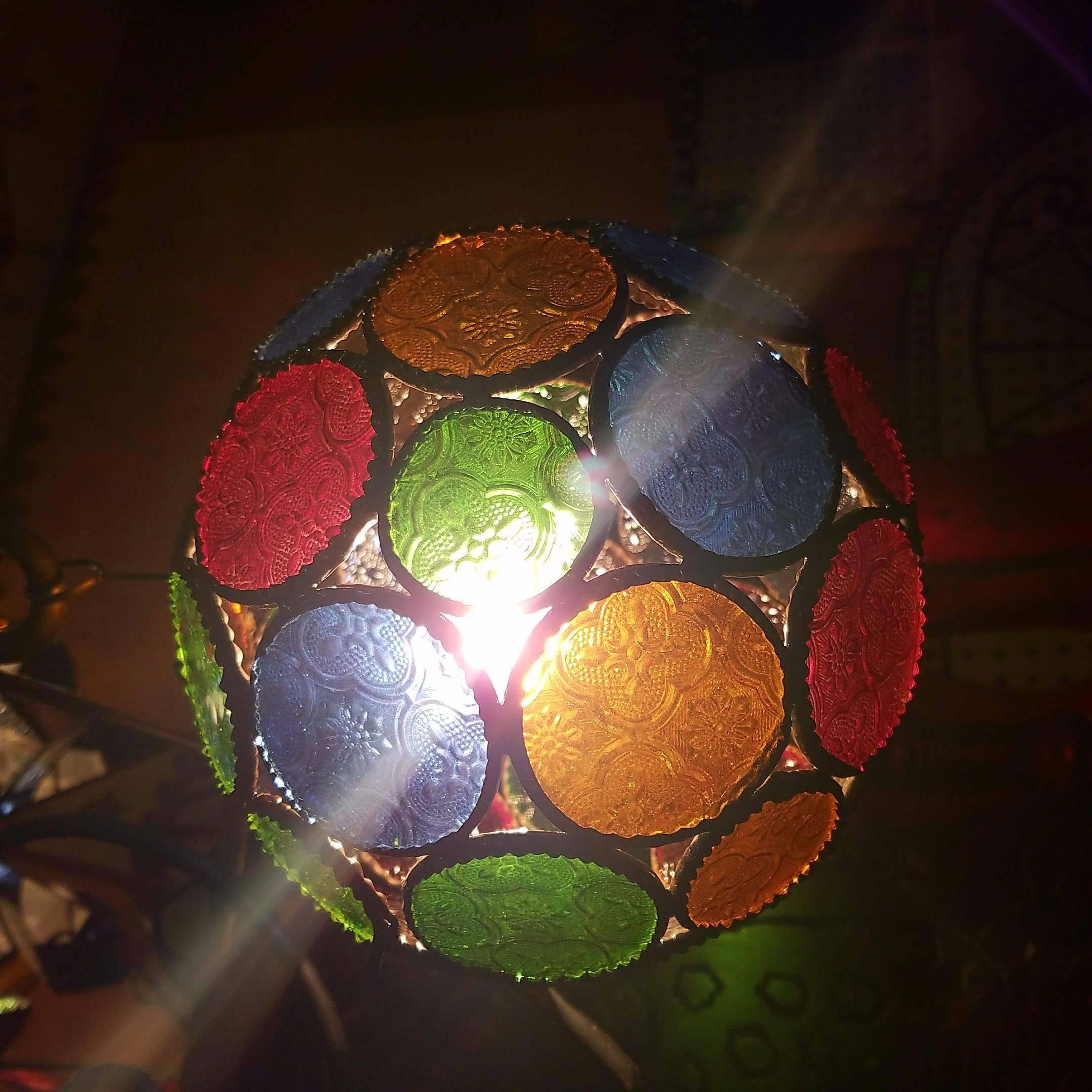 Small size all stained glass Moroccan ball lantern, measuring approximately 8 inches in diameter . 4 available in stock... Such an elegant piece that casts beautiful color shadows around your entire room.
Also available in 10