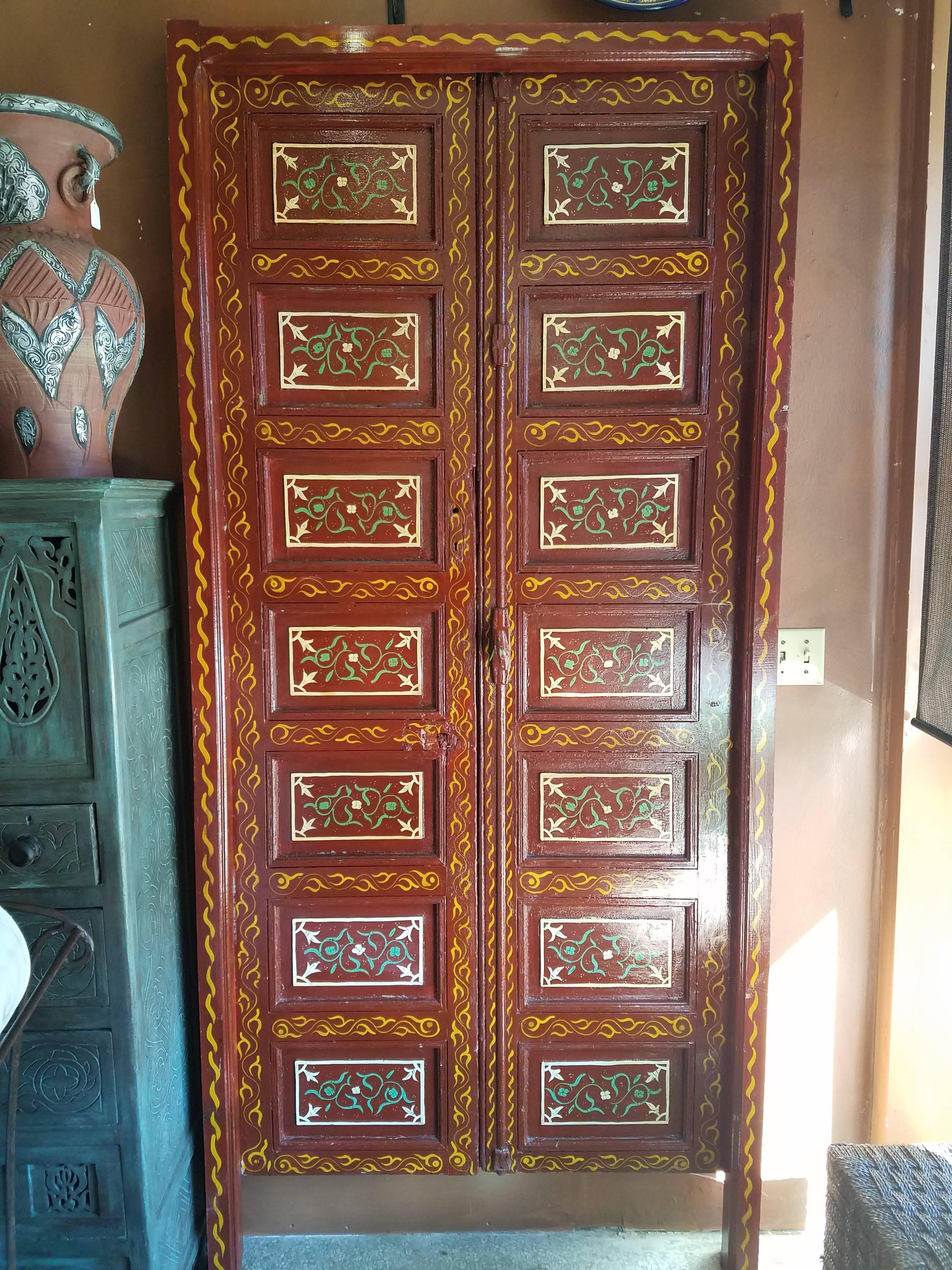 This handmade / hand-painted Moroccan wooden door measures approximately 95? in height by 43? in width. Great as a decorative piece, or to use as a functional door. Made of local (Moroccan) cedar wood.
      
      