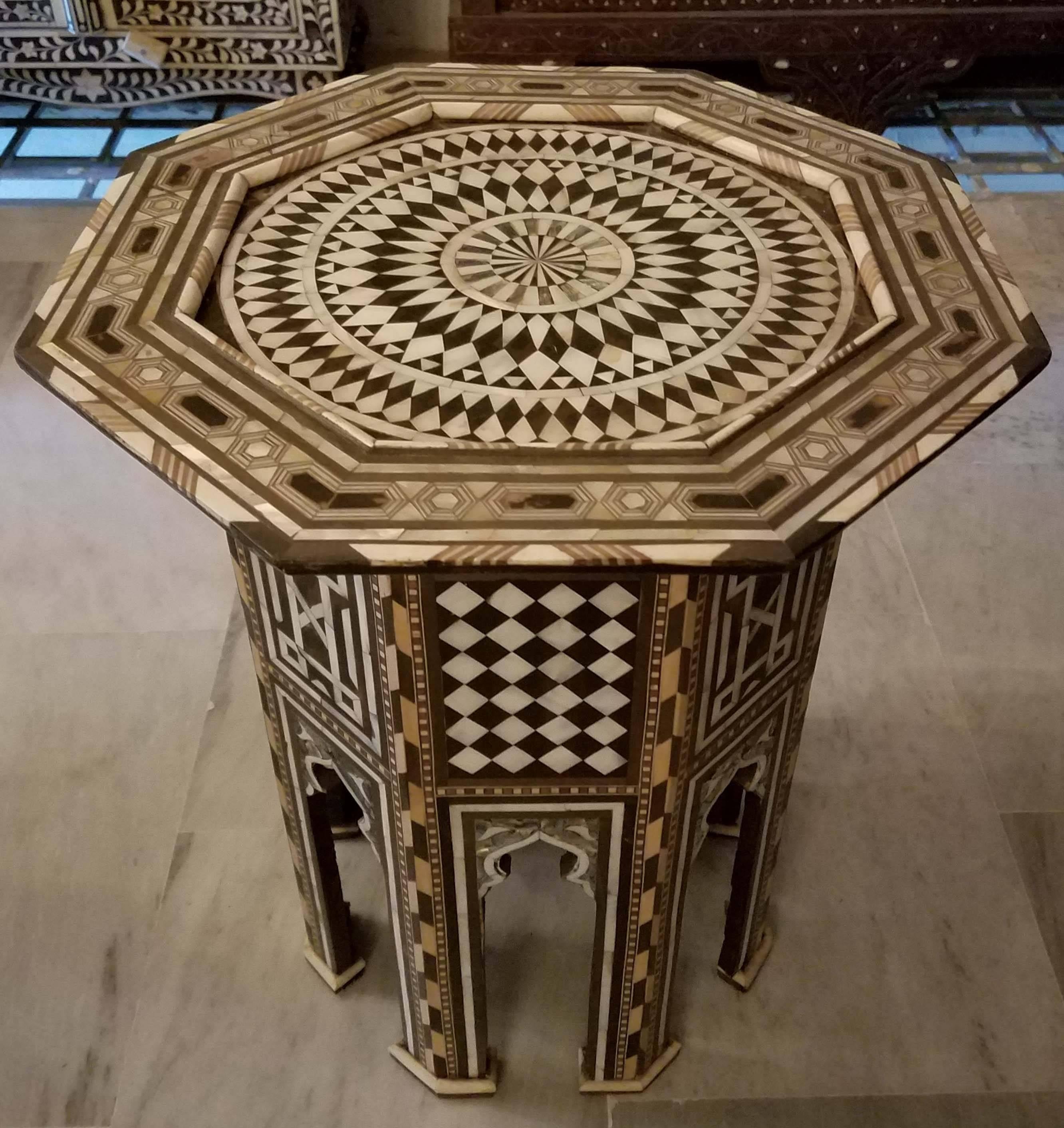 Syrian style mother-of-pearl side and rare shells made in Morocco by a fine Syrian artisan. Beautiful Inlay throughout thru amazing handcraftsmanship. Definitely a conversation piece. Must see to really appreciate.
Dimensions: Approximately 21