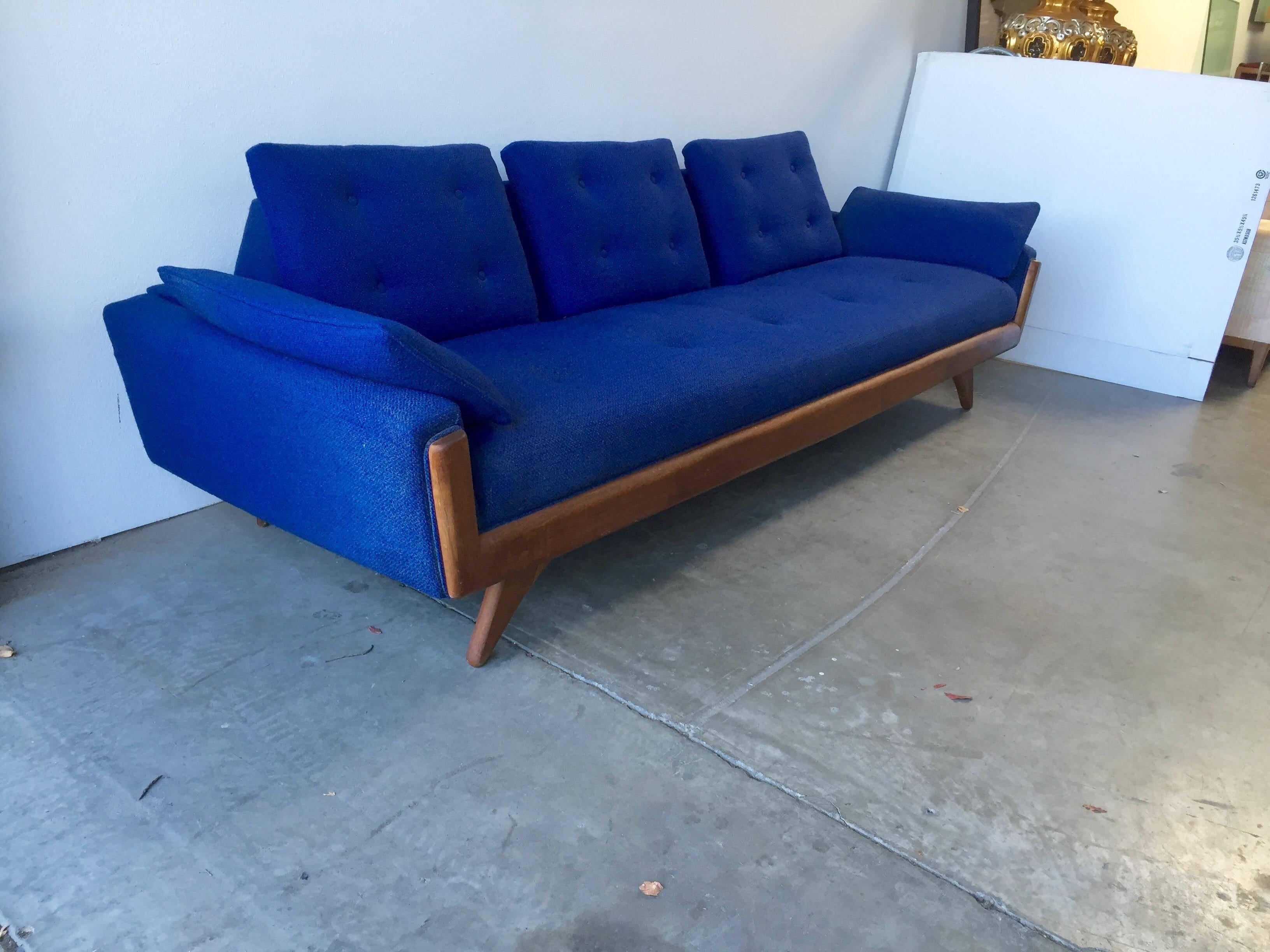An utterly gorgeous, Classic, Mid-Century Modern Adrian Pearsall style sofa. Original fabric, with button cushions, indicative of the MCM style. Walnut base.